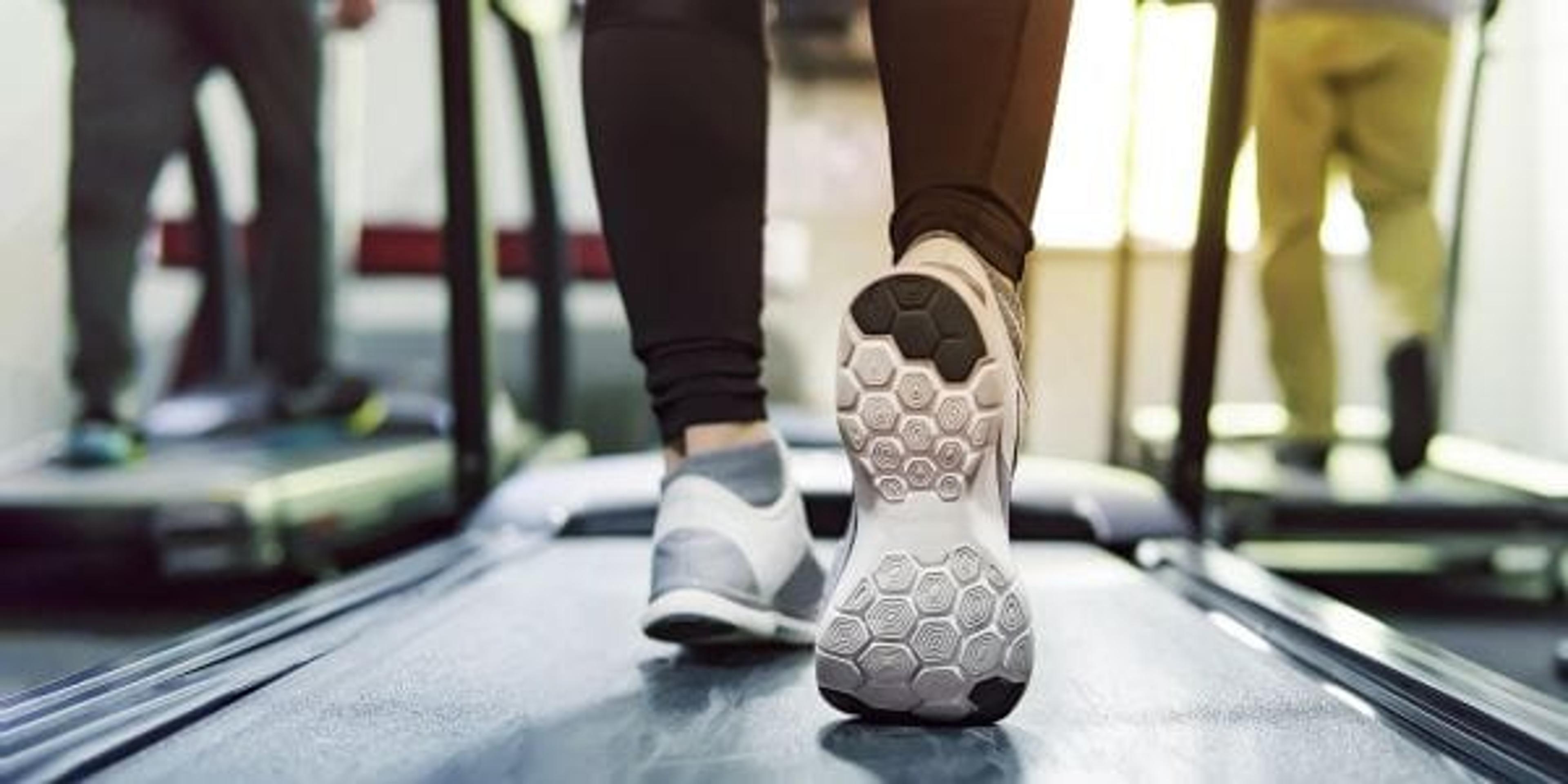 Image of person walking on a treadmill.