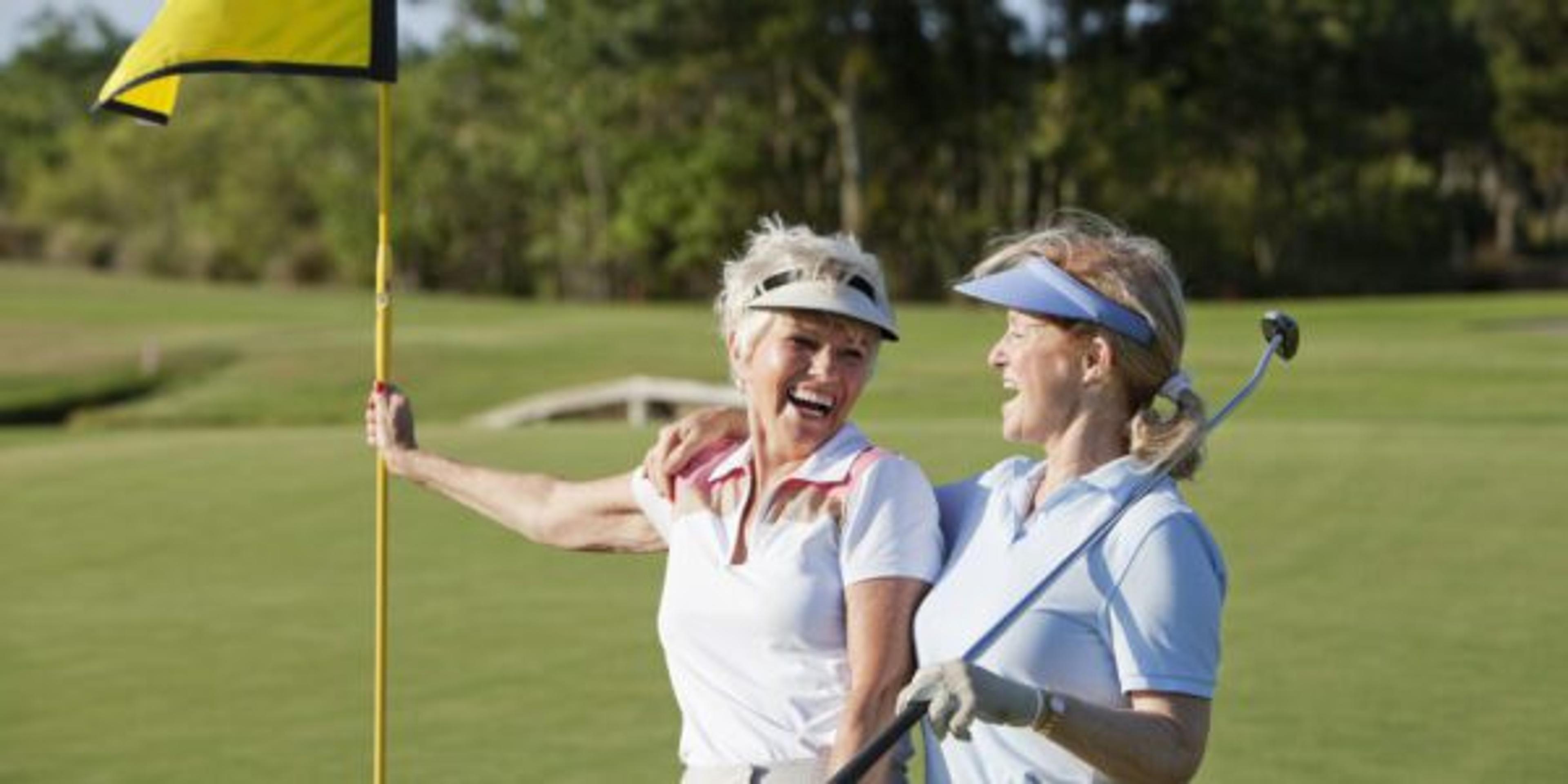Senior women enjoying the health benefits of golf.