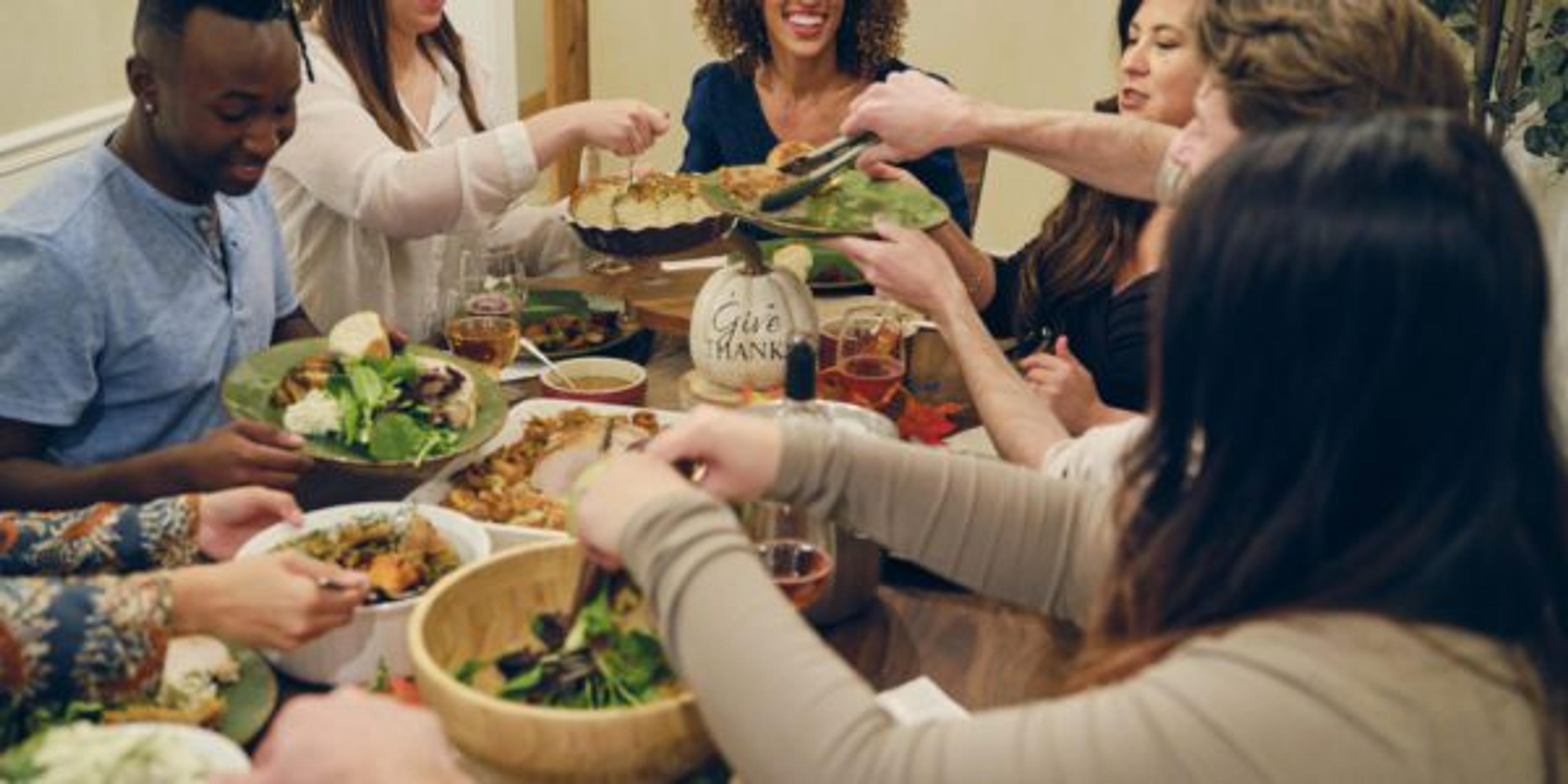 Friends Celebrating Thanksgiving Dinner Together