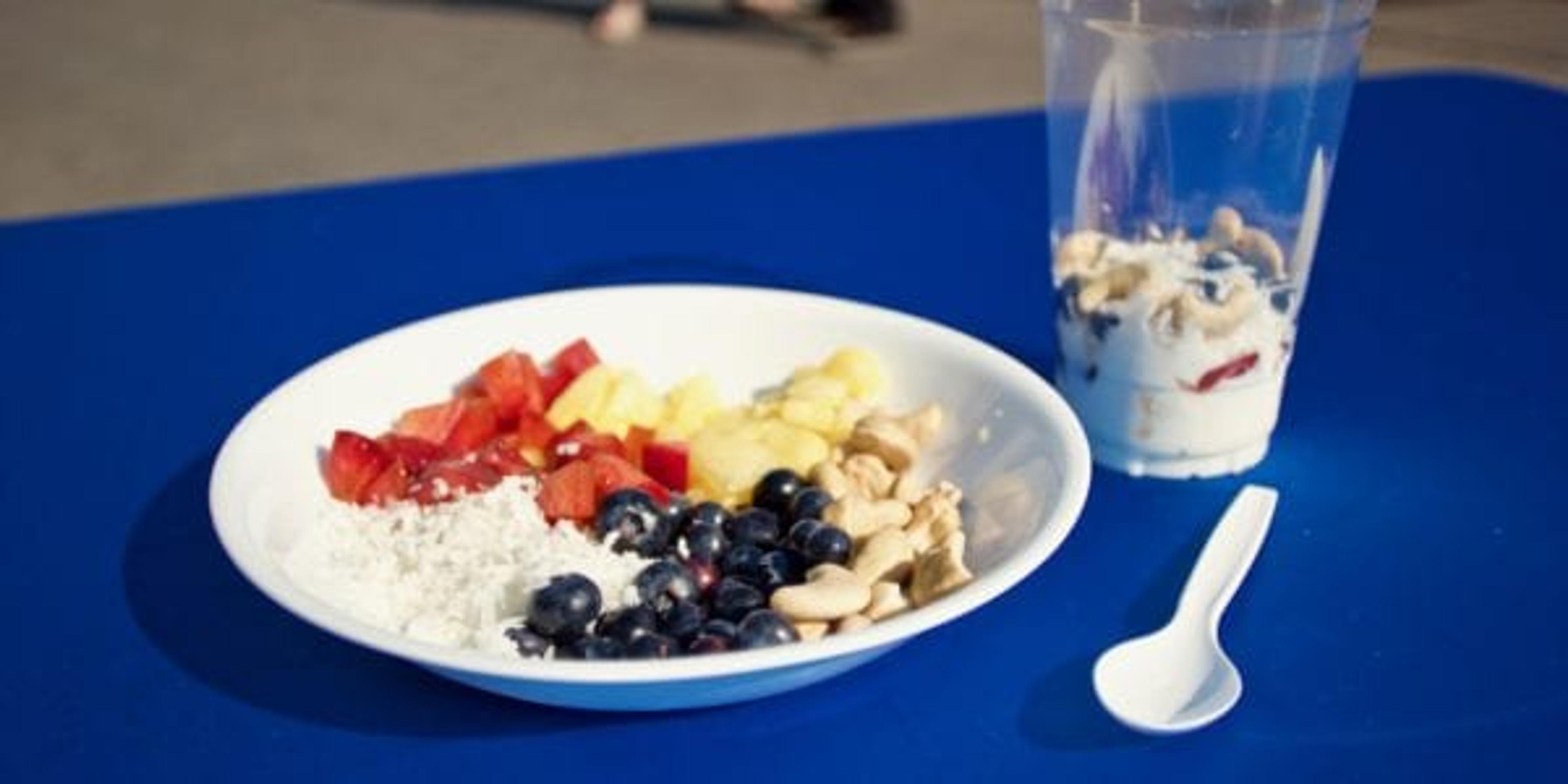 Yogurt and ingredients on a plate.