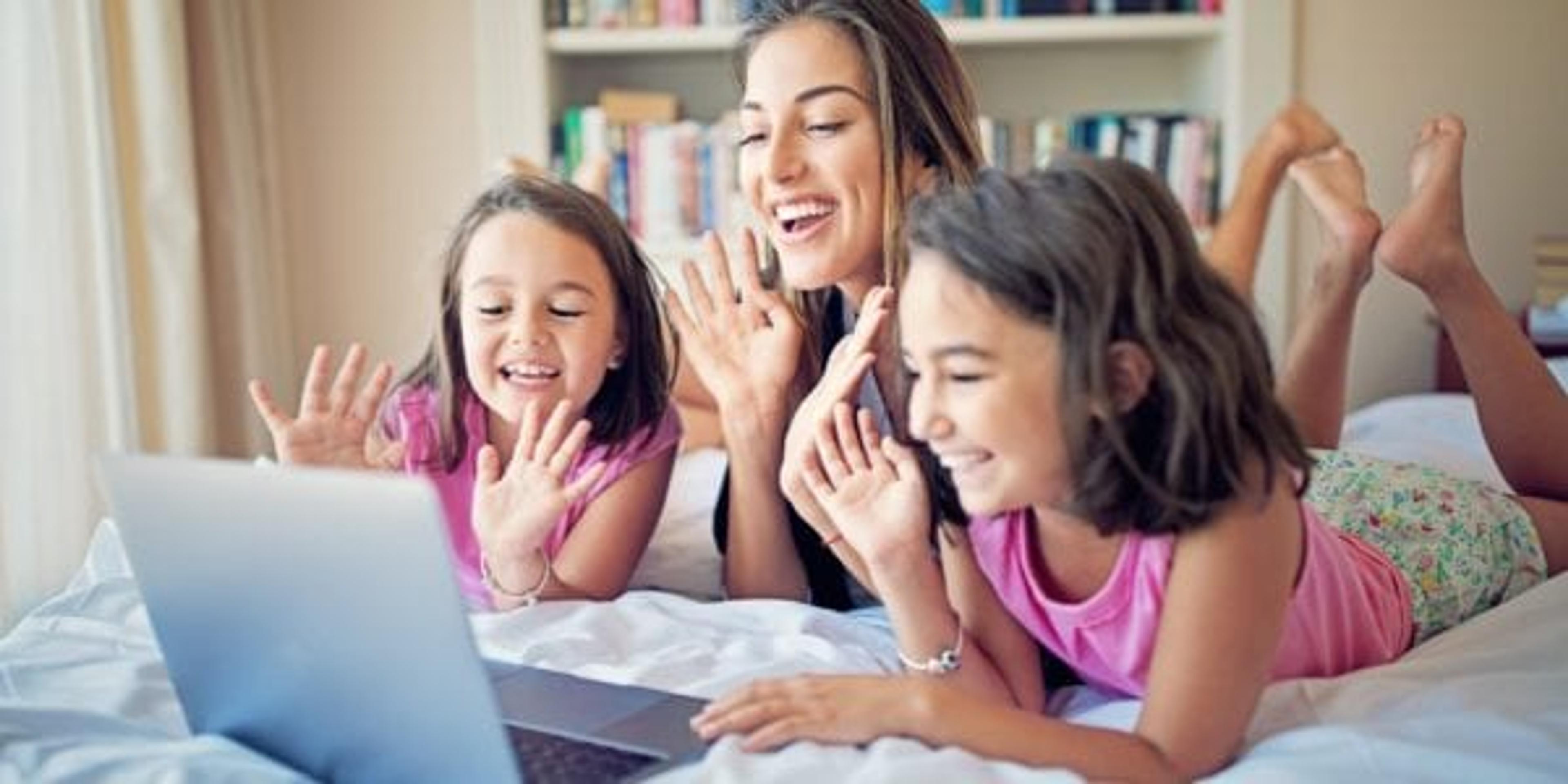 Mother and her daughters are making video call