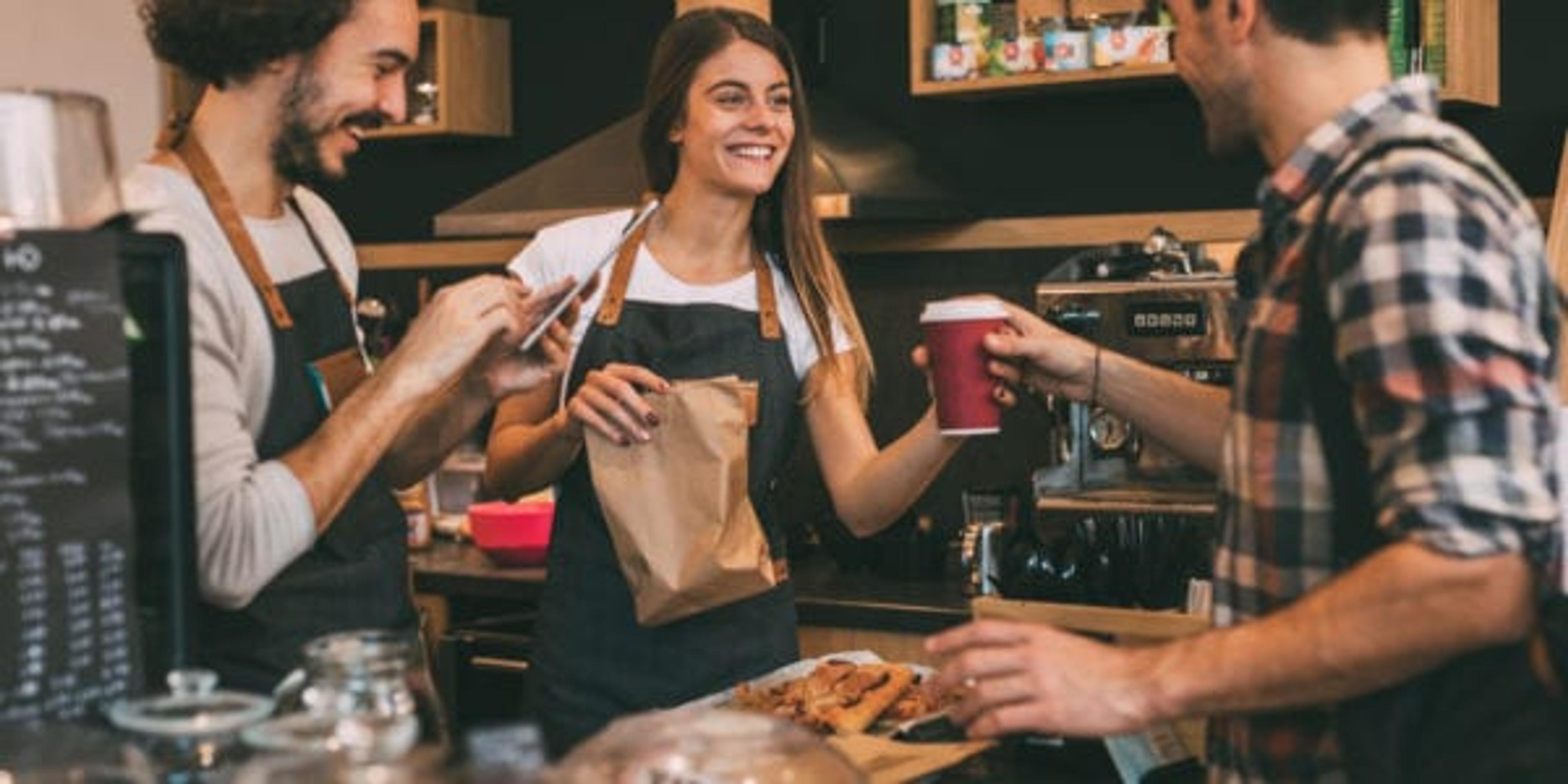 Man taking his order at a coffee shop