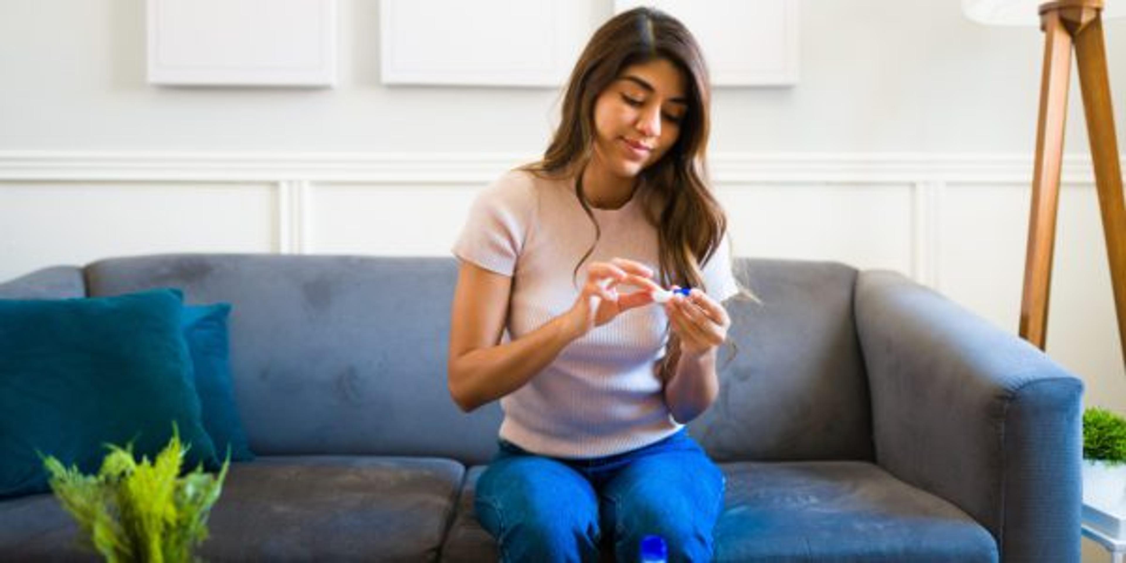 A woman using contact lenses for a better vision