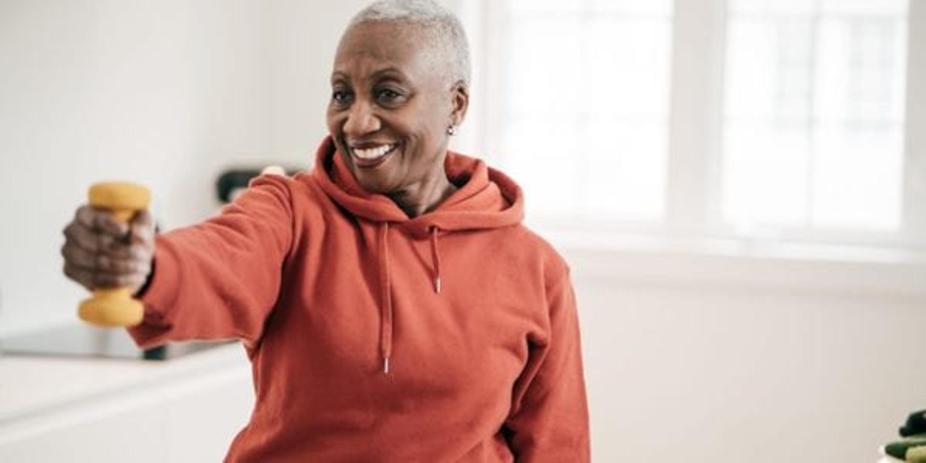 Older woman lifting weights