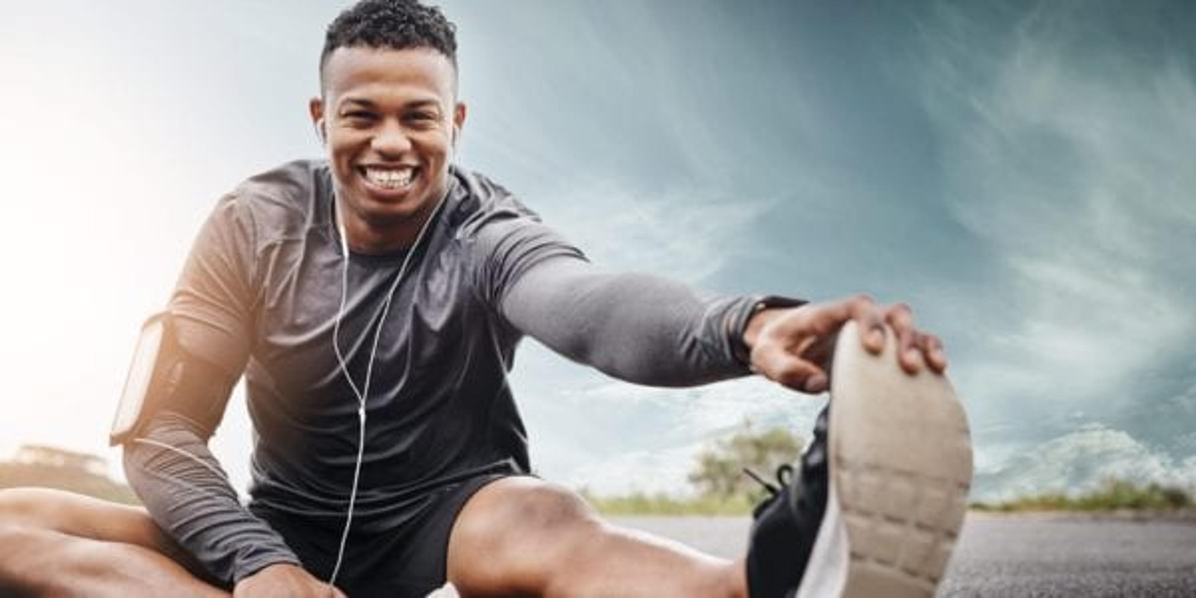 Portrait of a sporty young man exercising outdoors