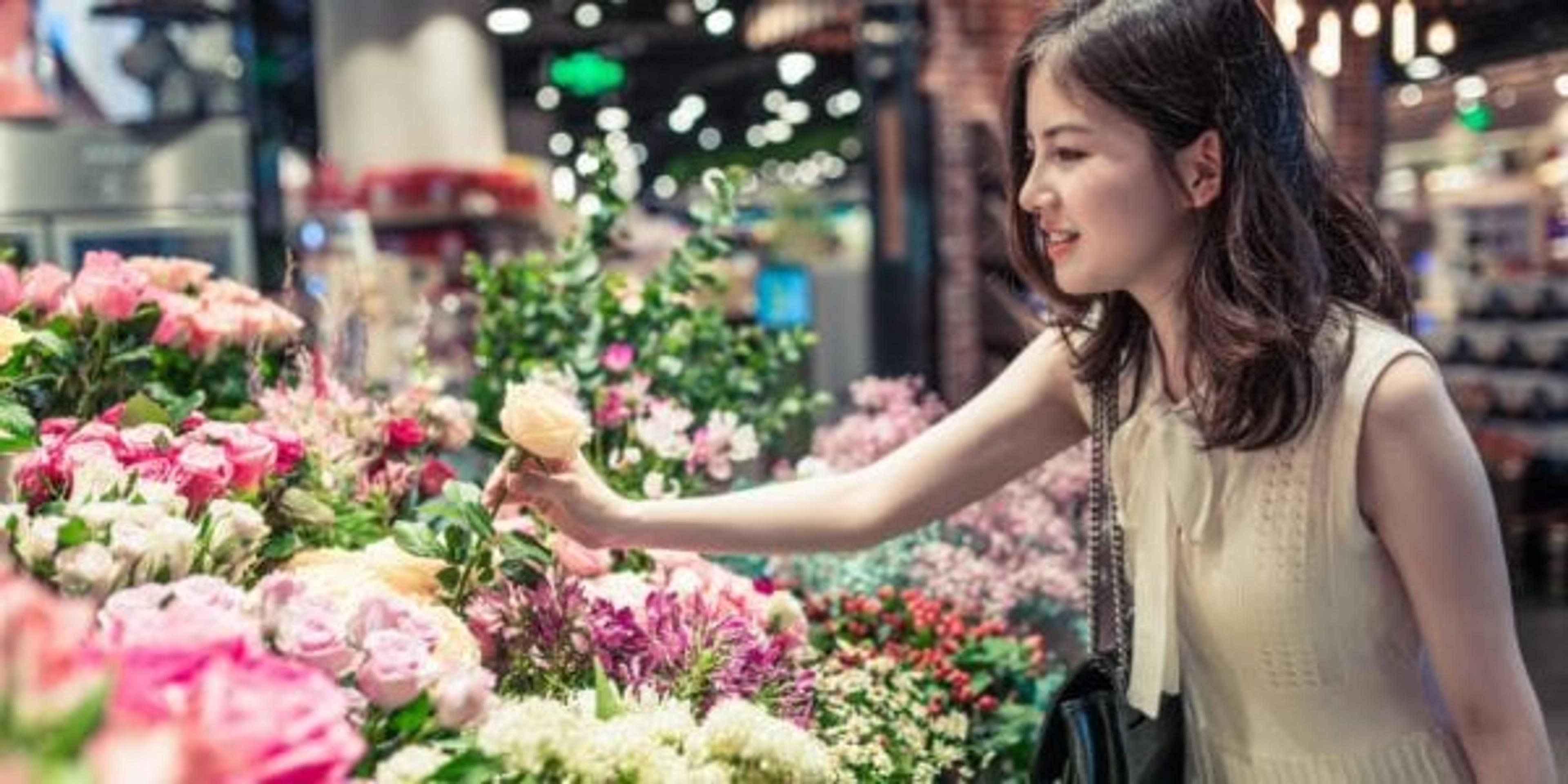 Woman shopping for flowers