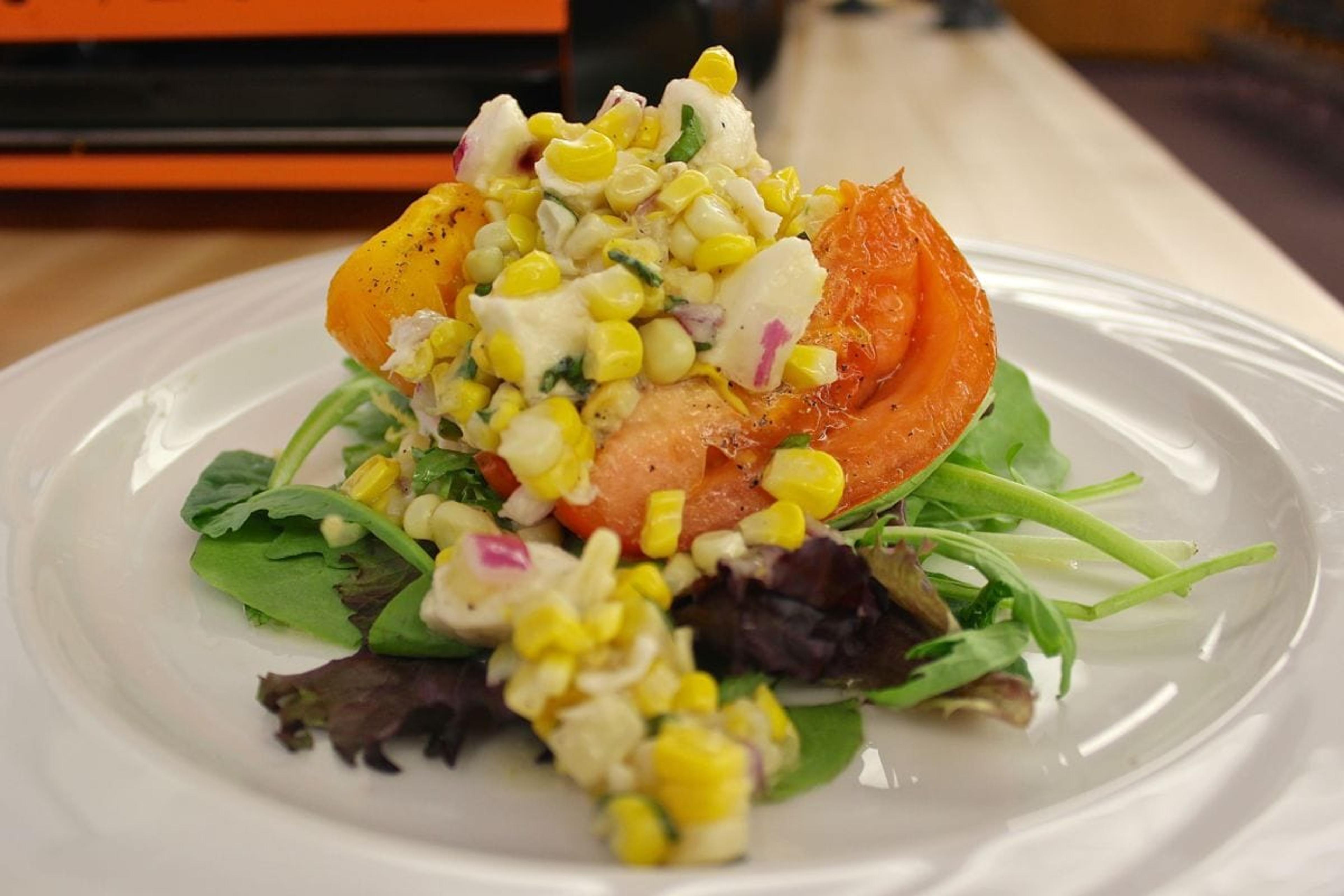 Image of grilled tomato with corn salsa