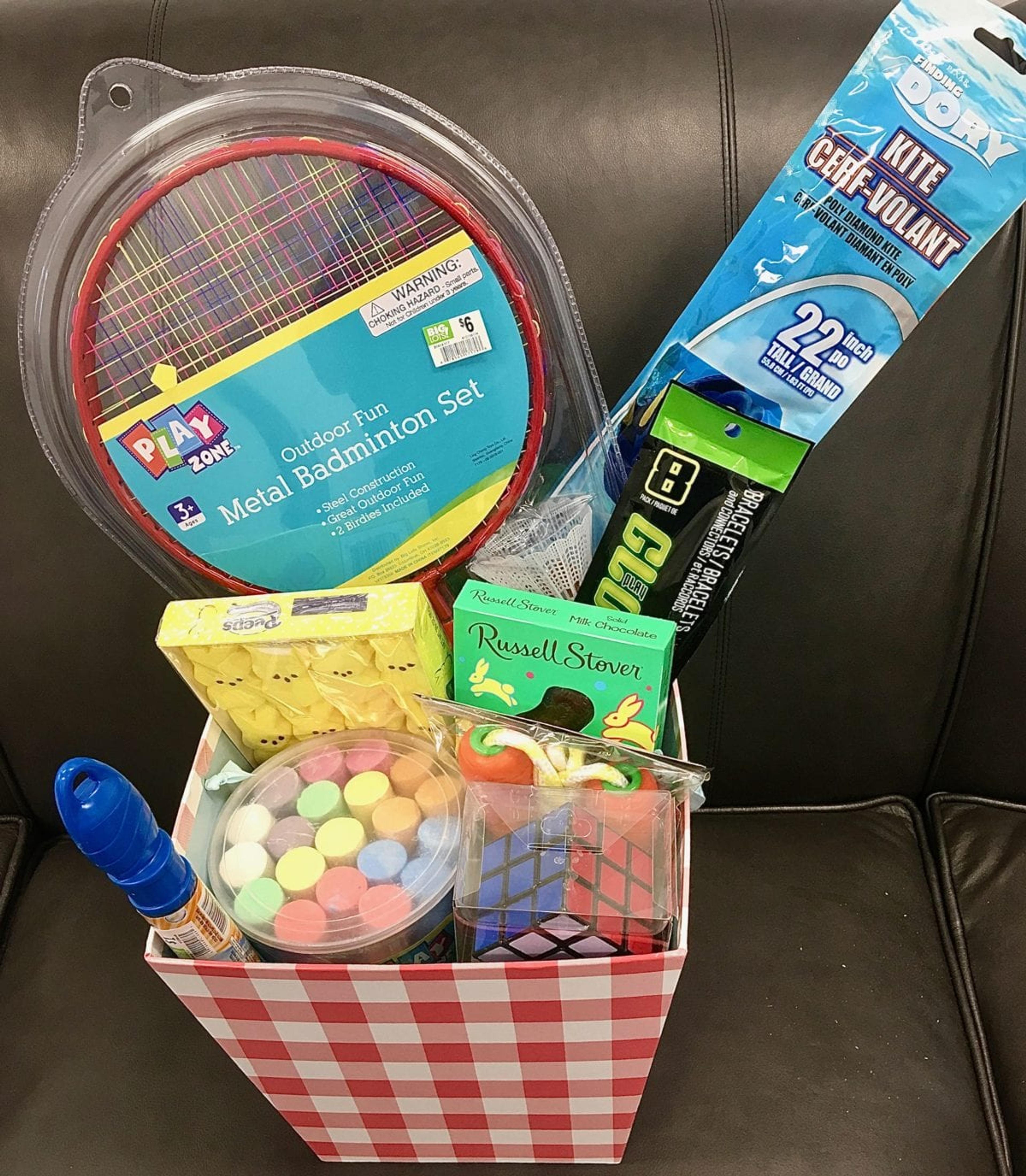 Outdoor Easter basket with chalk and a badminton set