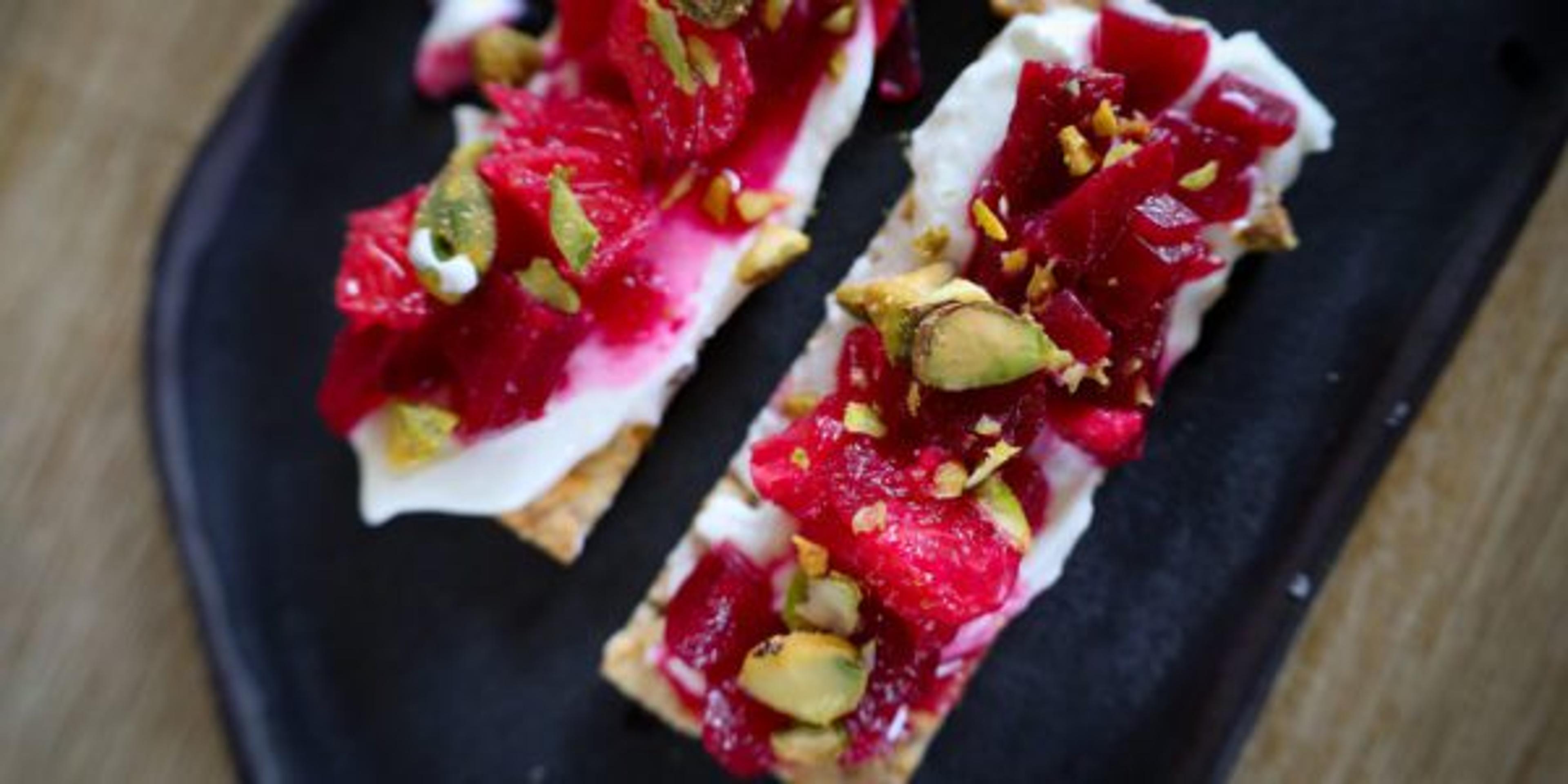 The orange-infused yogurt is the perfect flavor accompaniment for the bruschetta while pistachios add a contrasting crunch.