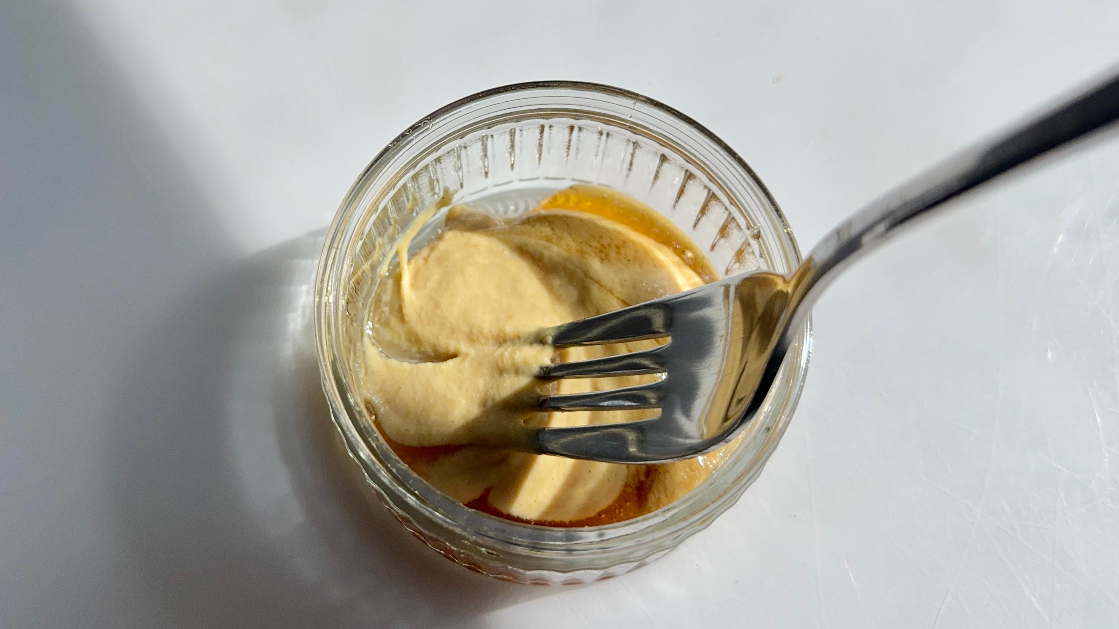 In a small bowl, combine Dijon mustard, honey, salt and pepper to taste and whisk.