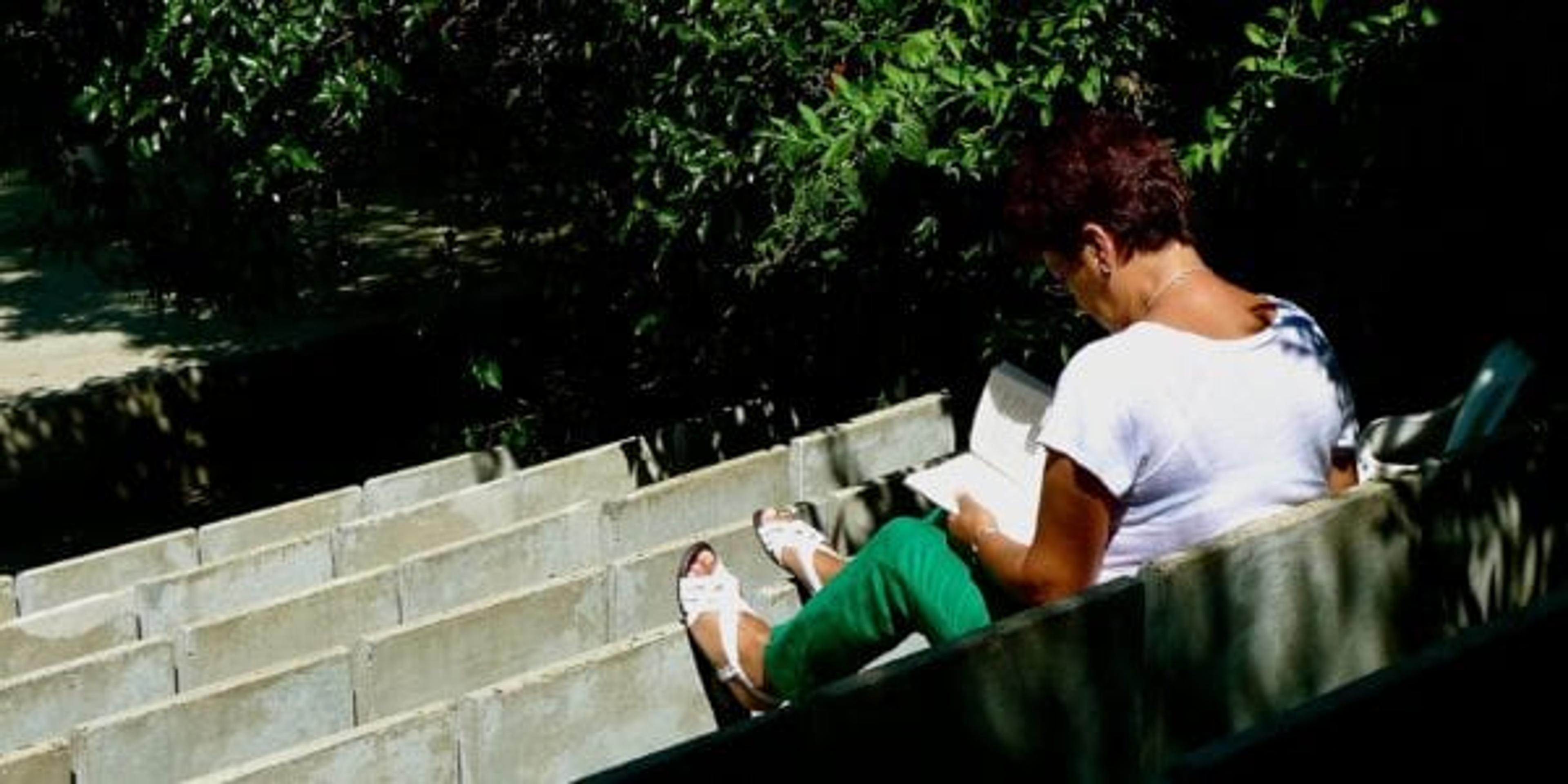 woman reading book