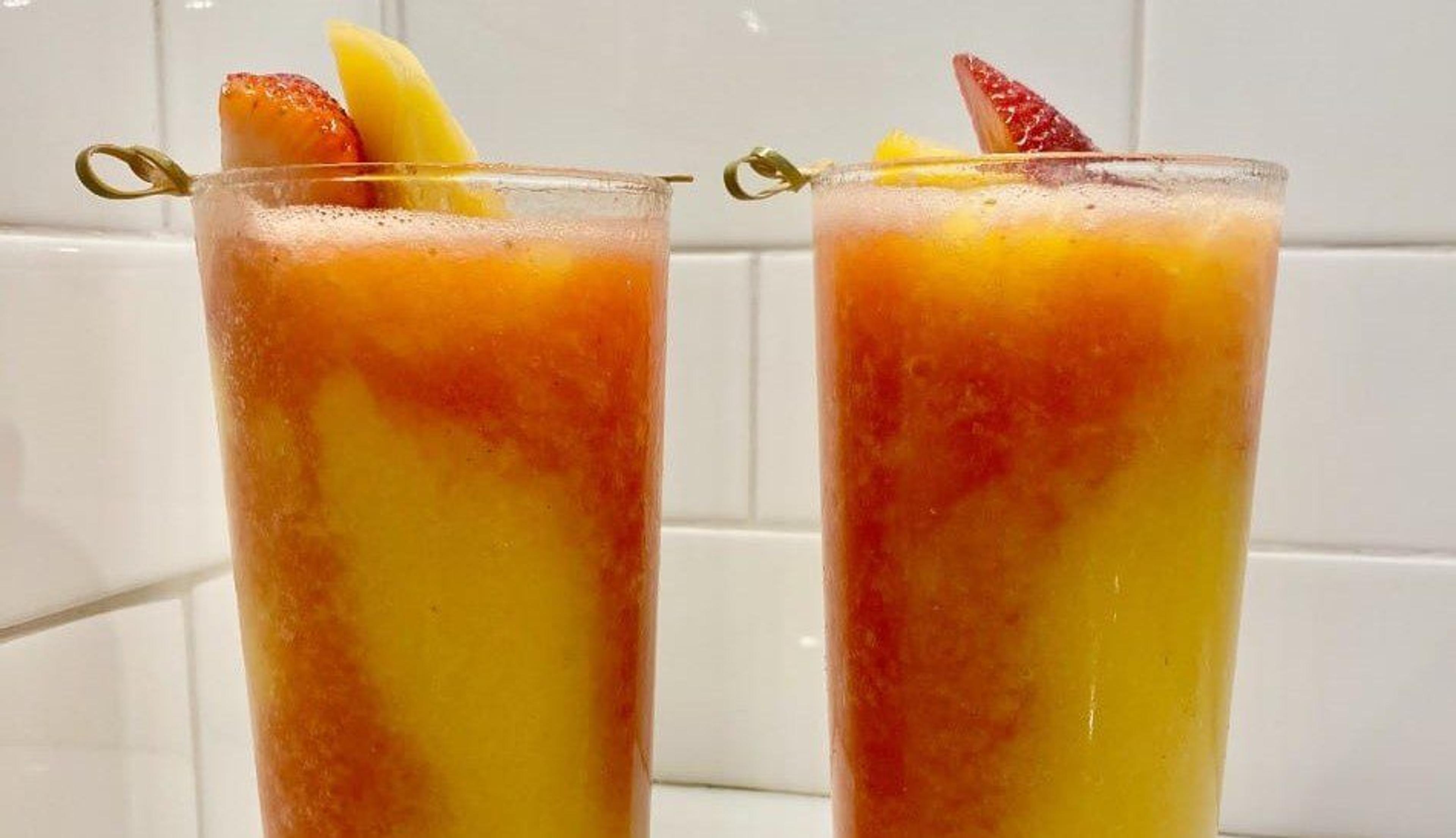 Layered strawberry mango mockarita.