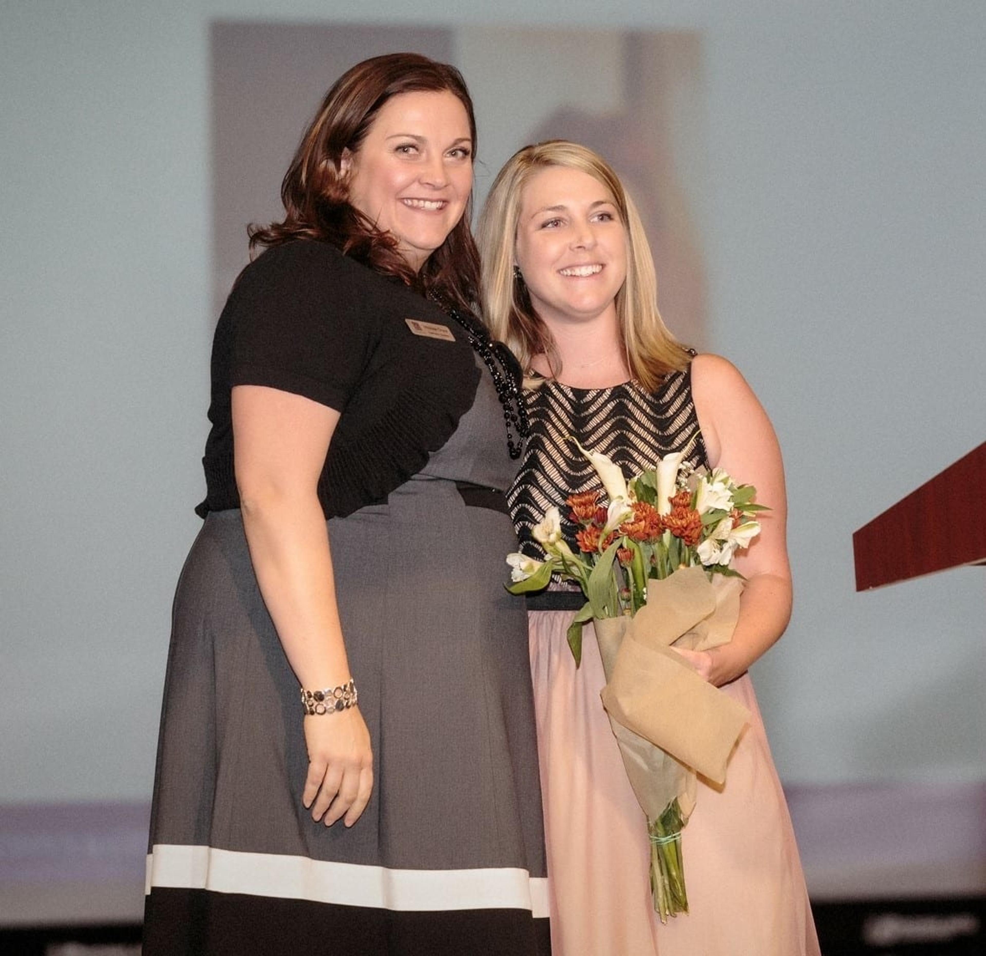 two women at award ceremony