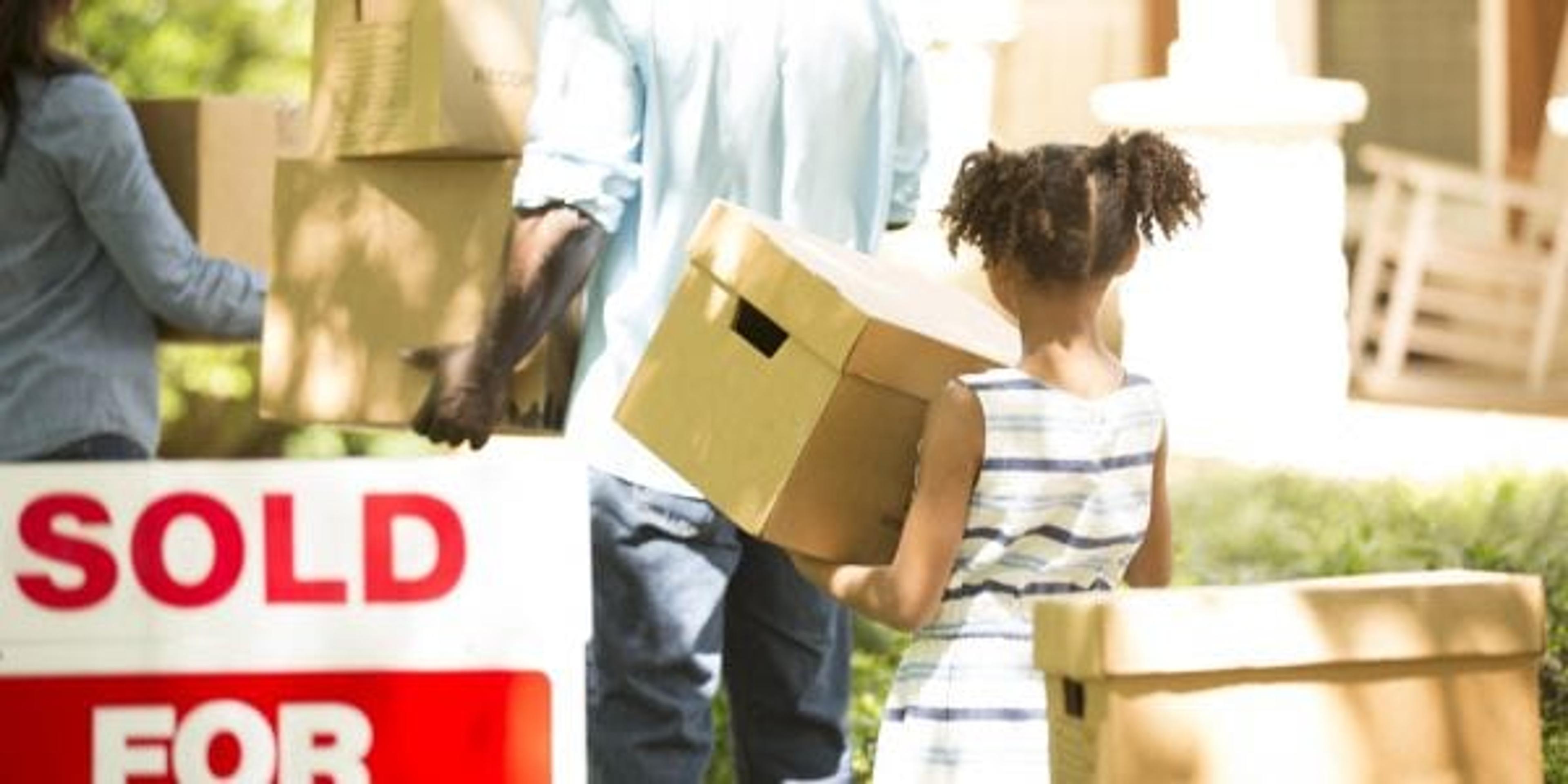 Family moving into a new home