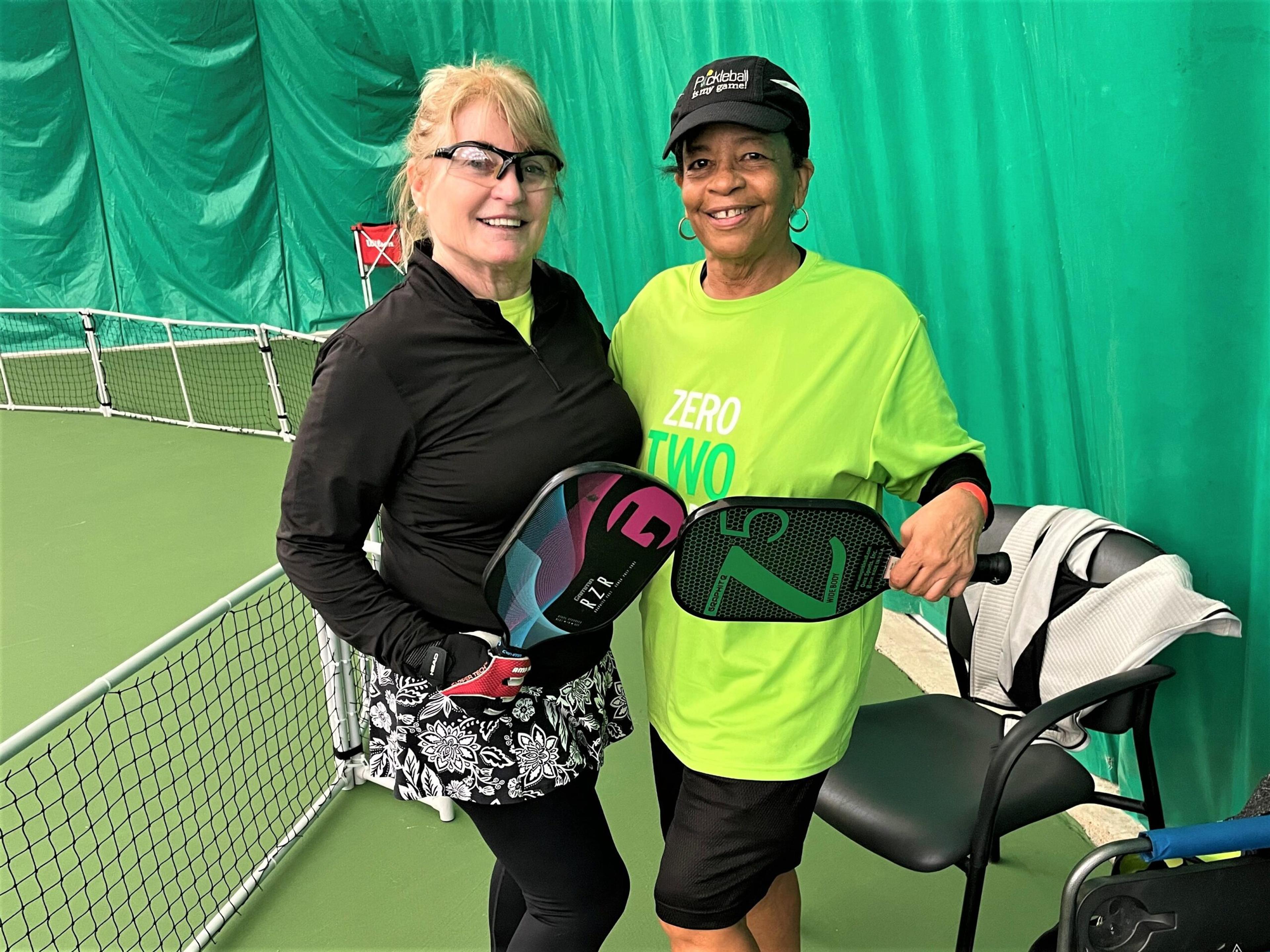 Lorna Rose, left, and Avis Taylor, right, pose for a photo at the March 2023 Michigan Senior Olympics.