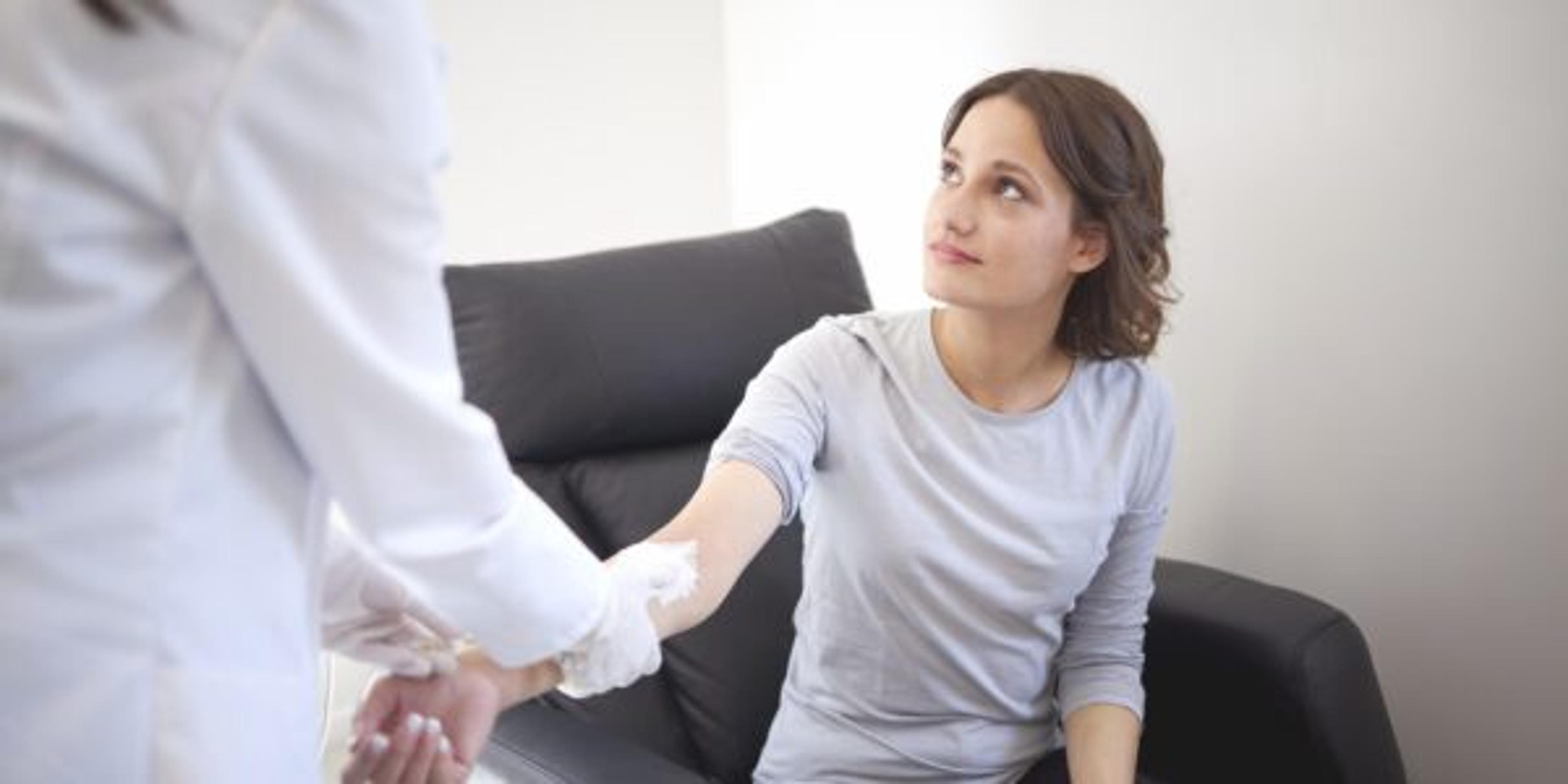 Preparation for blood test by female doctor medical uniform in white bright room