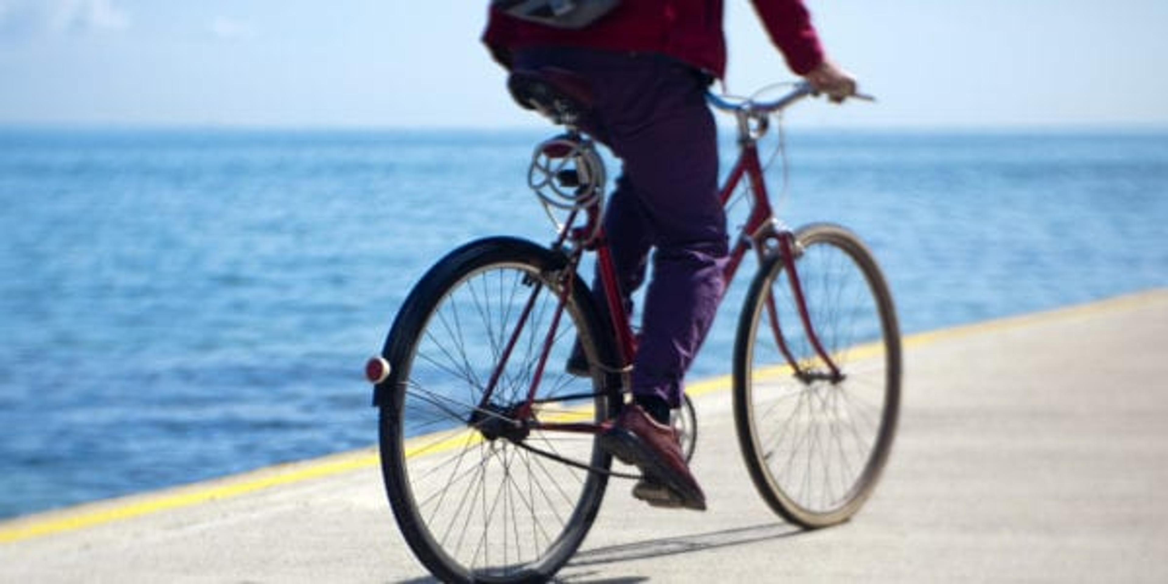 man riding bike