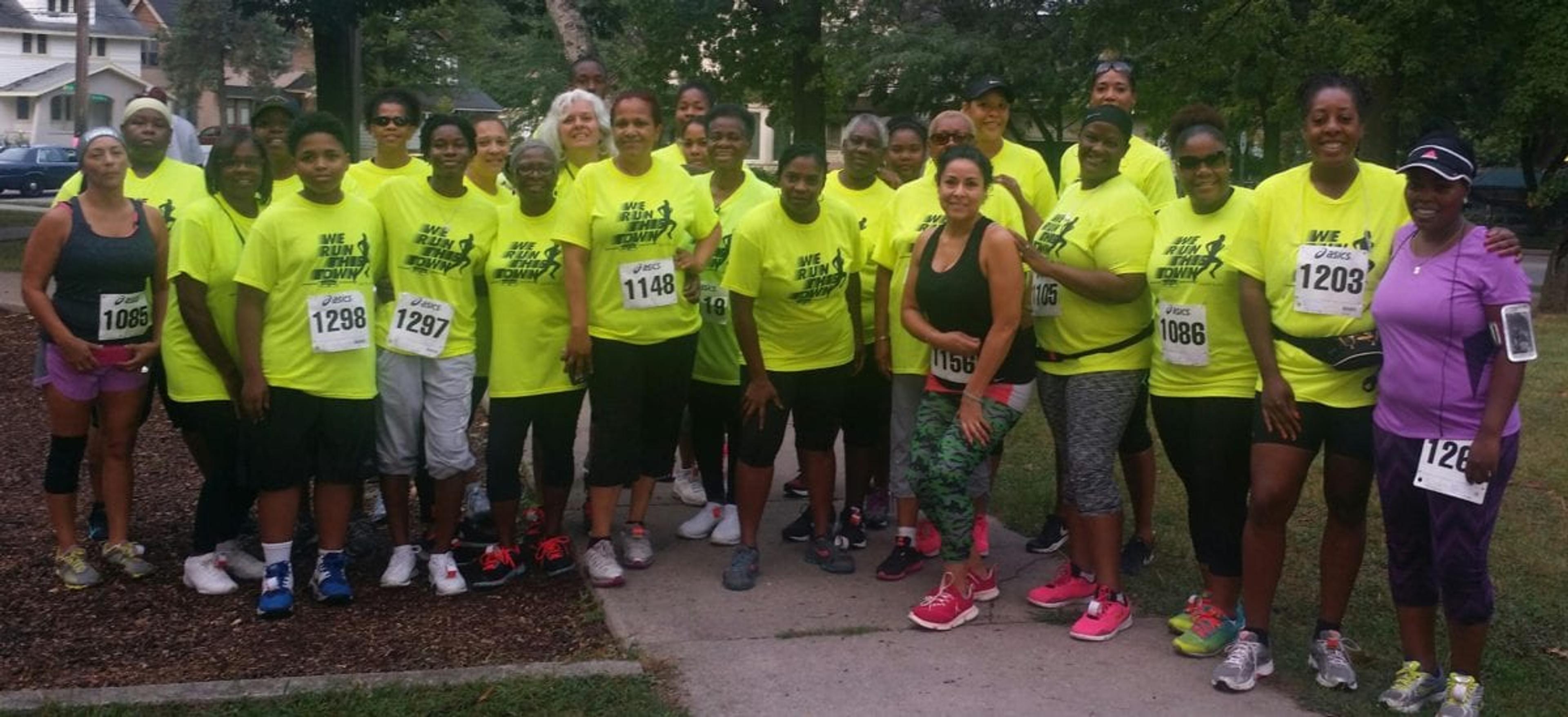 Tenisa Frye with her children and members of Inner City Community Advocates.