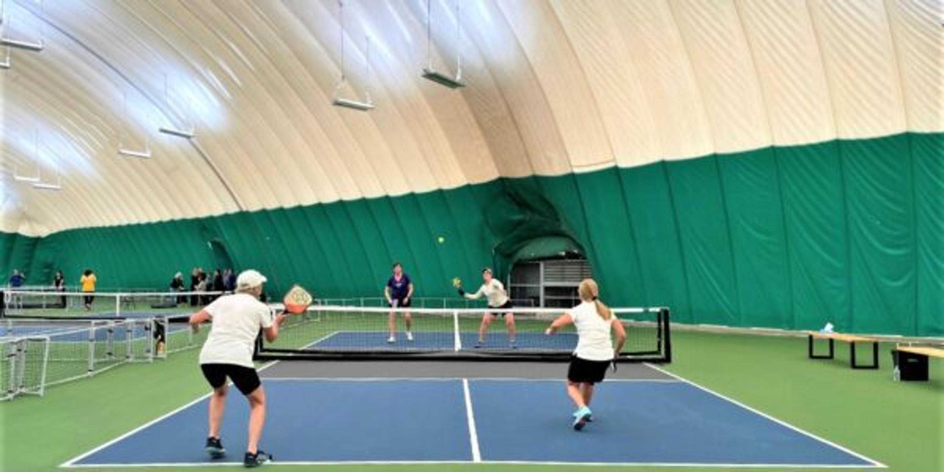 Women play pickleball at the Michigan Senior Olympics event during March 2023 in Rochester at Lifetime Fitness.