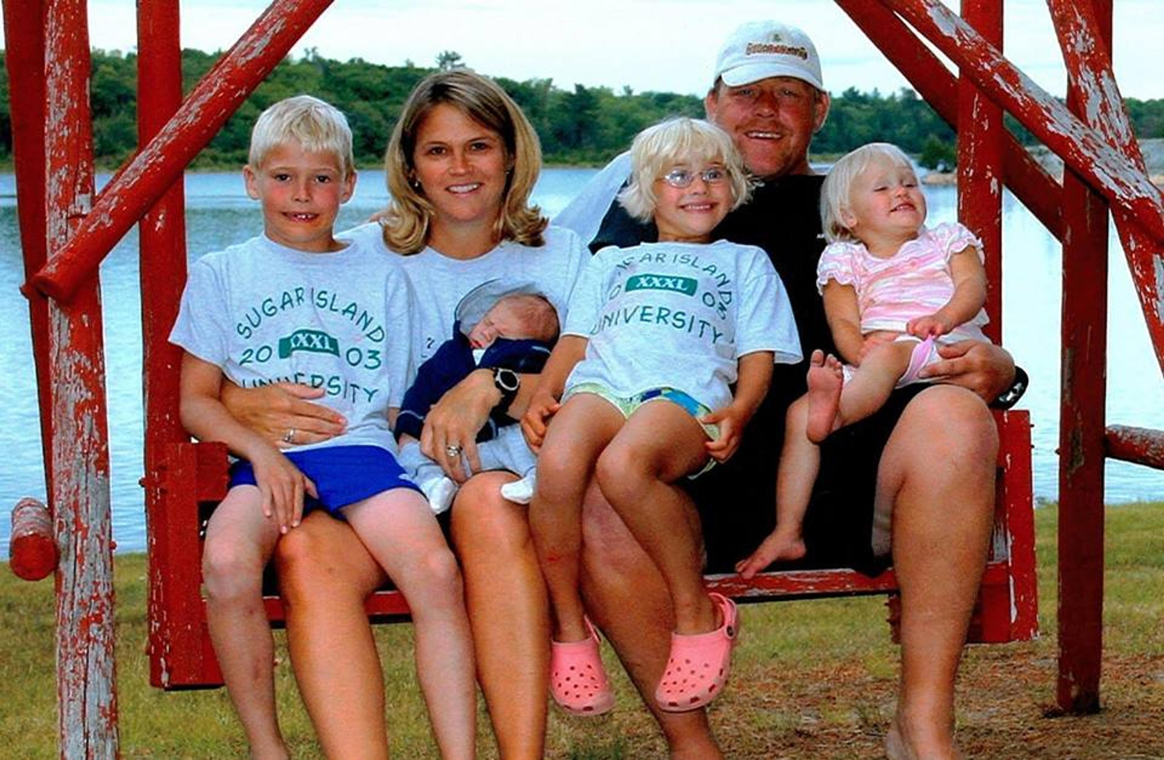 Tanya and Todd Overweg with their children. Photo courtesy of the Overweg family. 