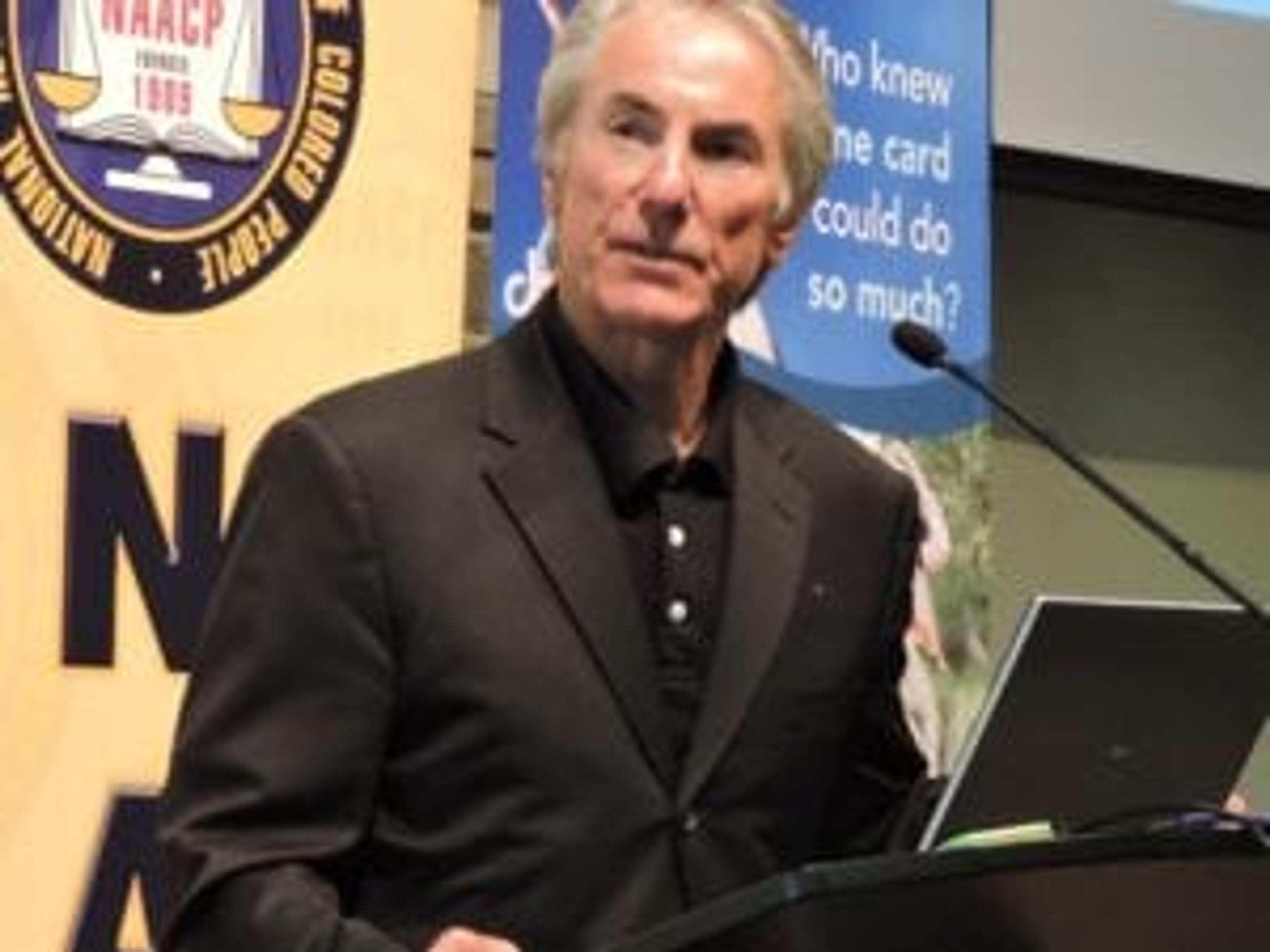 Reverend Dr. Michael Barry speaking at a recent Faith in Wellness luncheon in Grand Rapids. Photo credit: Julie Bitely