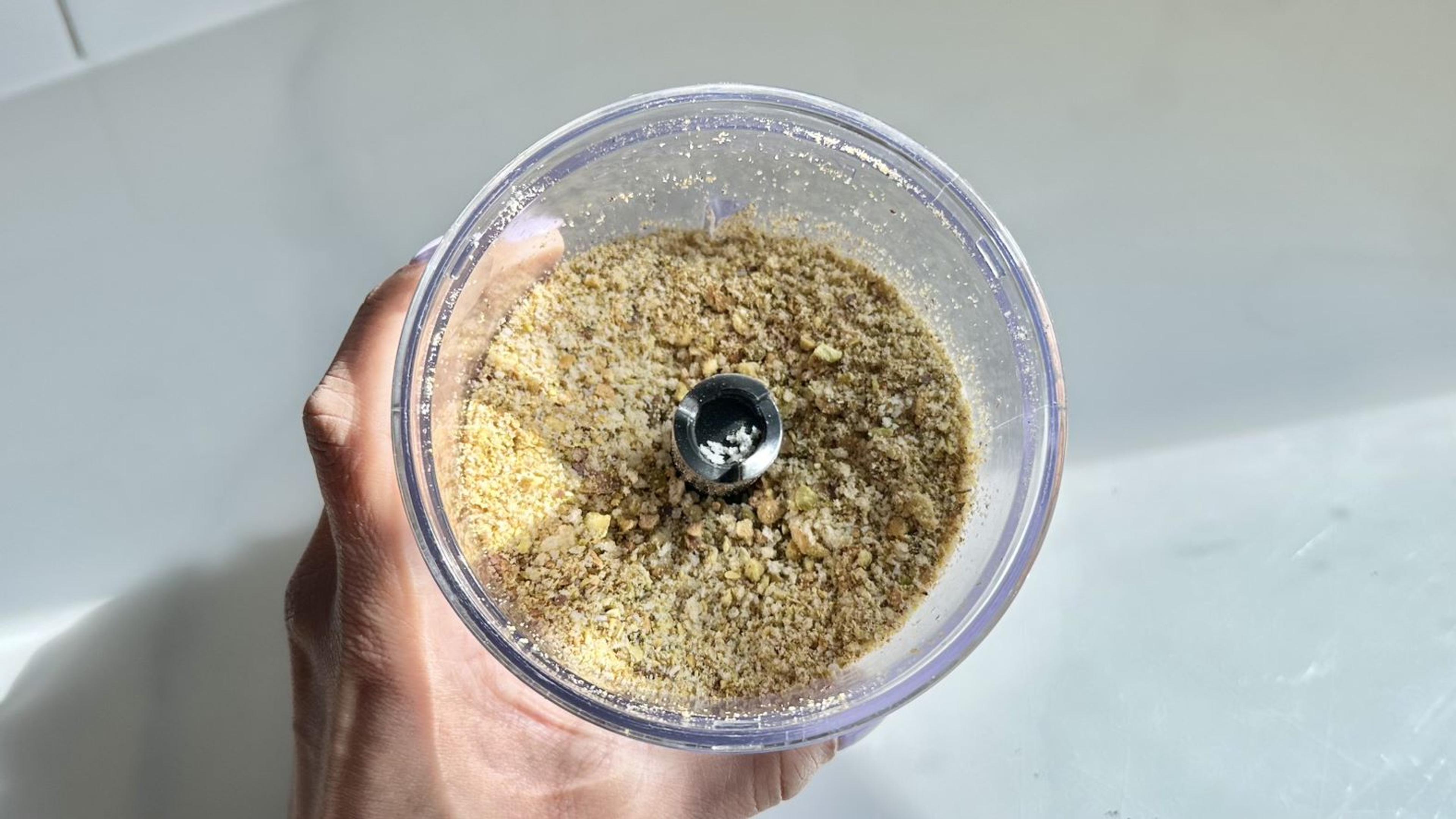 In a food processor, combine panko breadcrumbs, pistachios, and salt and pepper. If you do not have a food processor, finely chop the pistachios and combine with breadcrumbs.