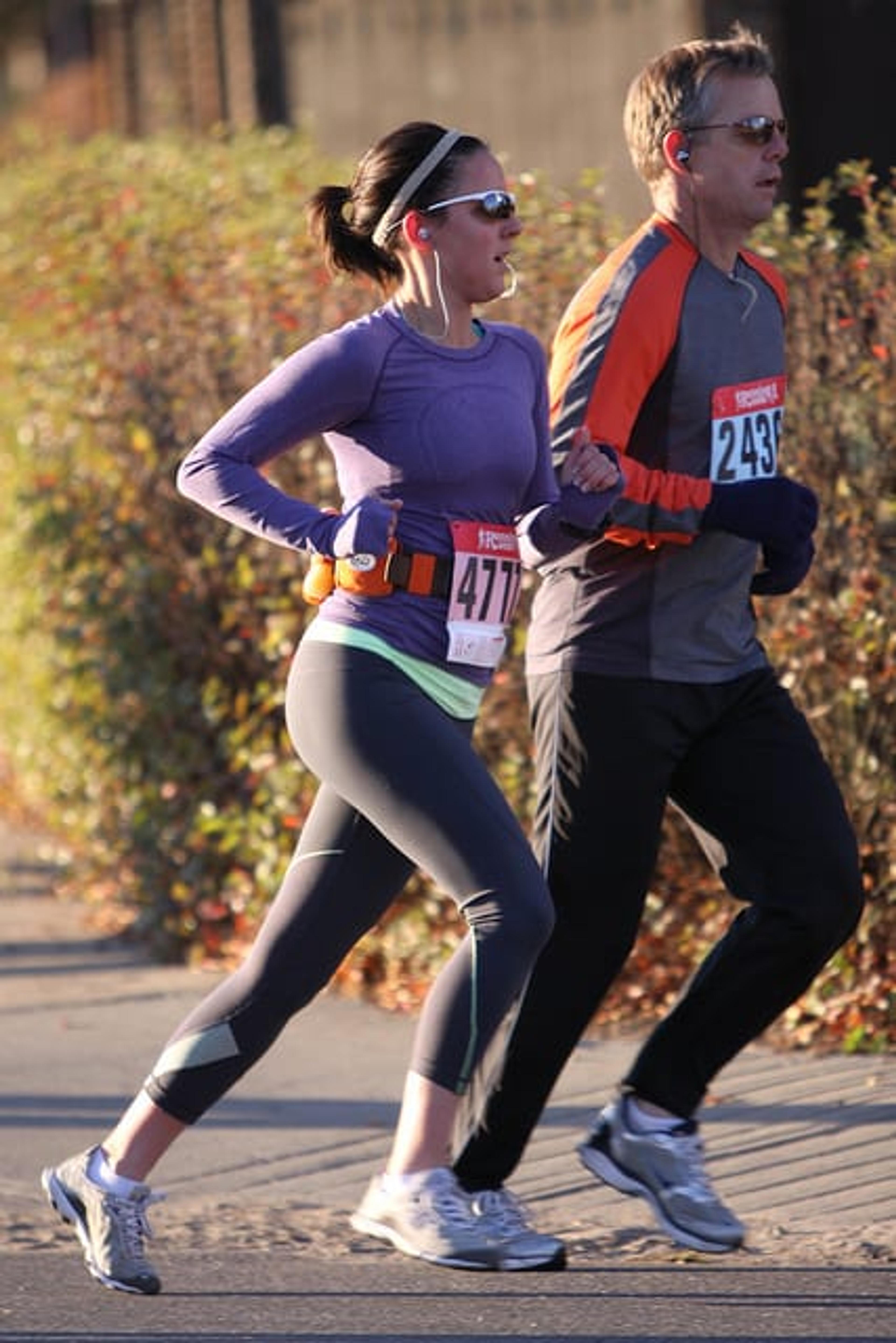 man and women running