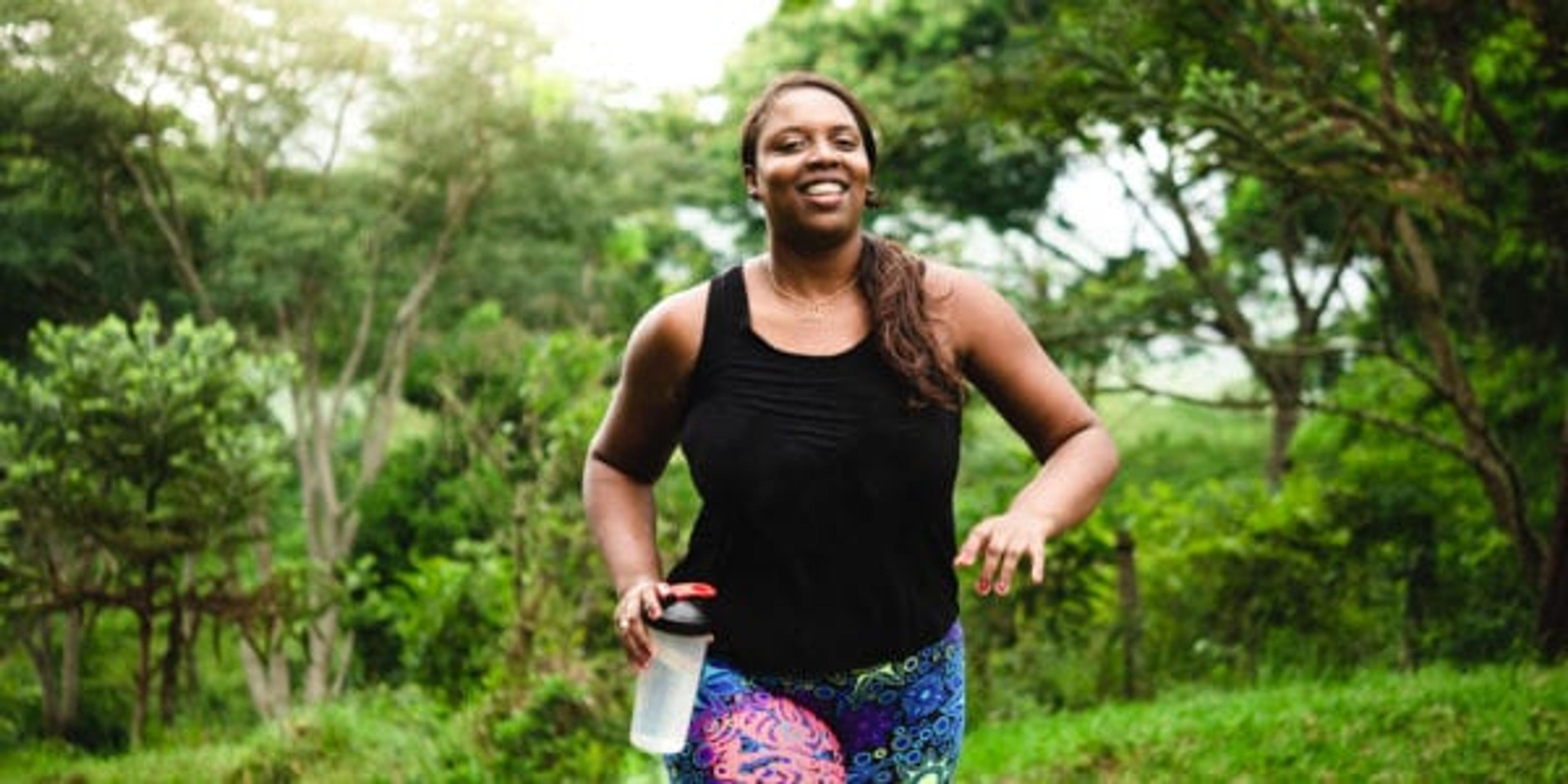 Brazilian woman body positive exercising in nature.