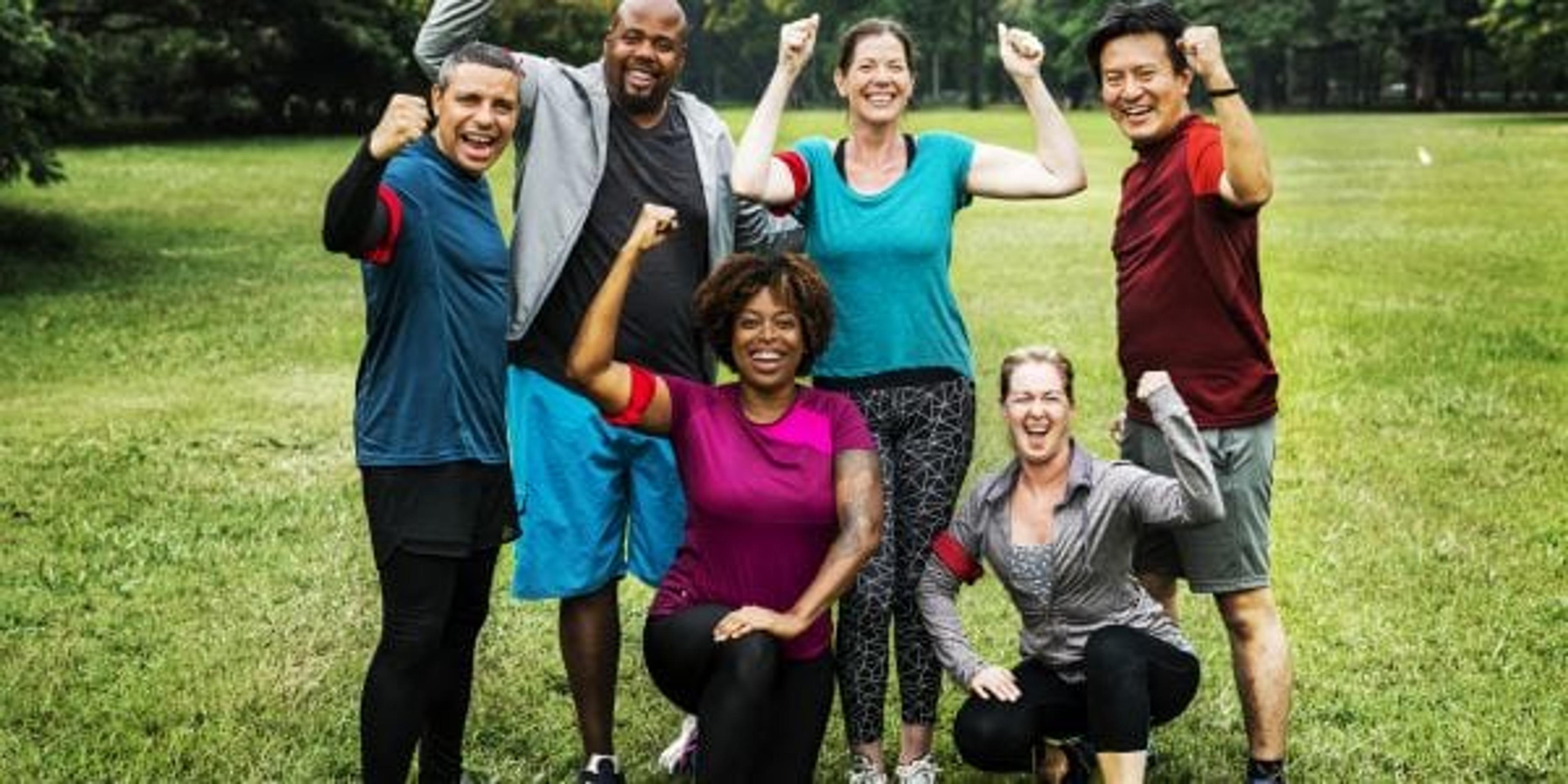 Group of cheerful diverse friends in the park