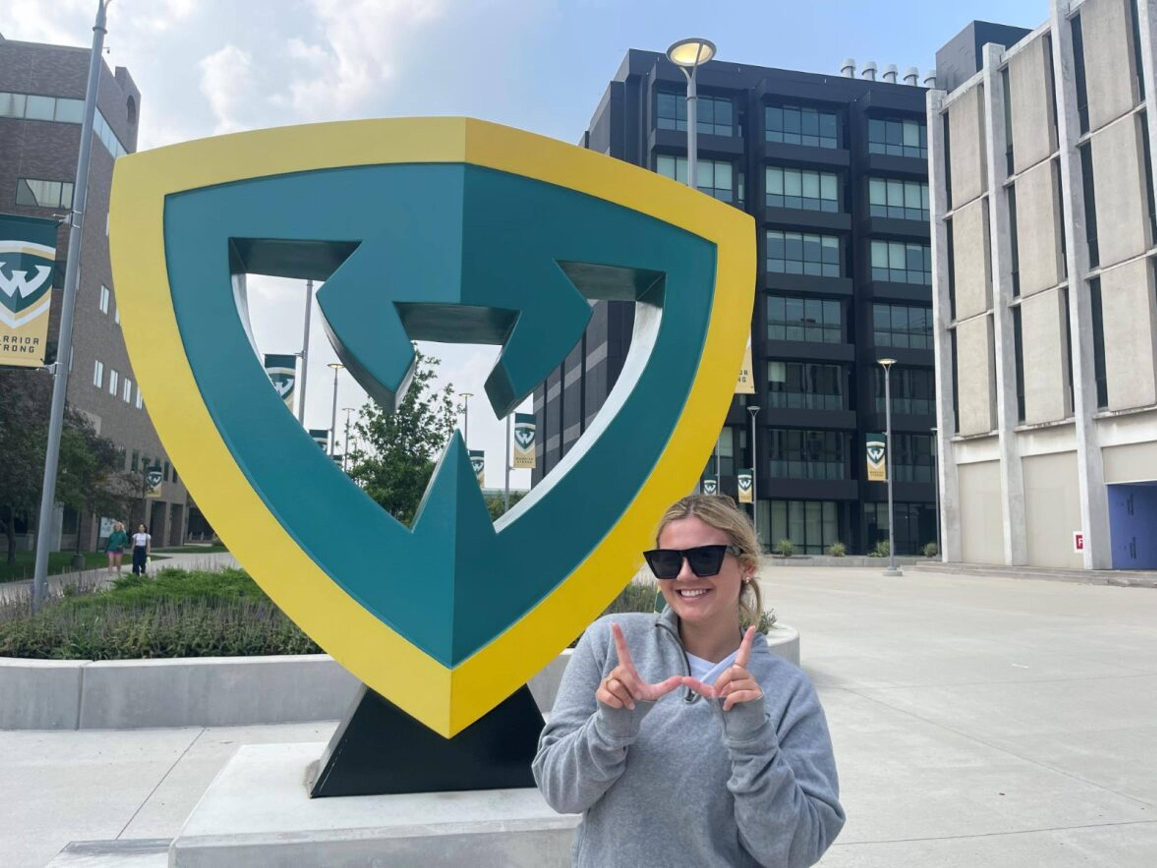 Jozlynn Blankenbaker poses for a photo on the Wayne State University campus.