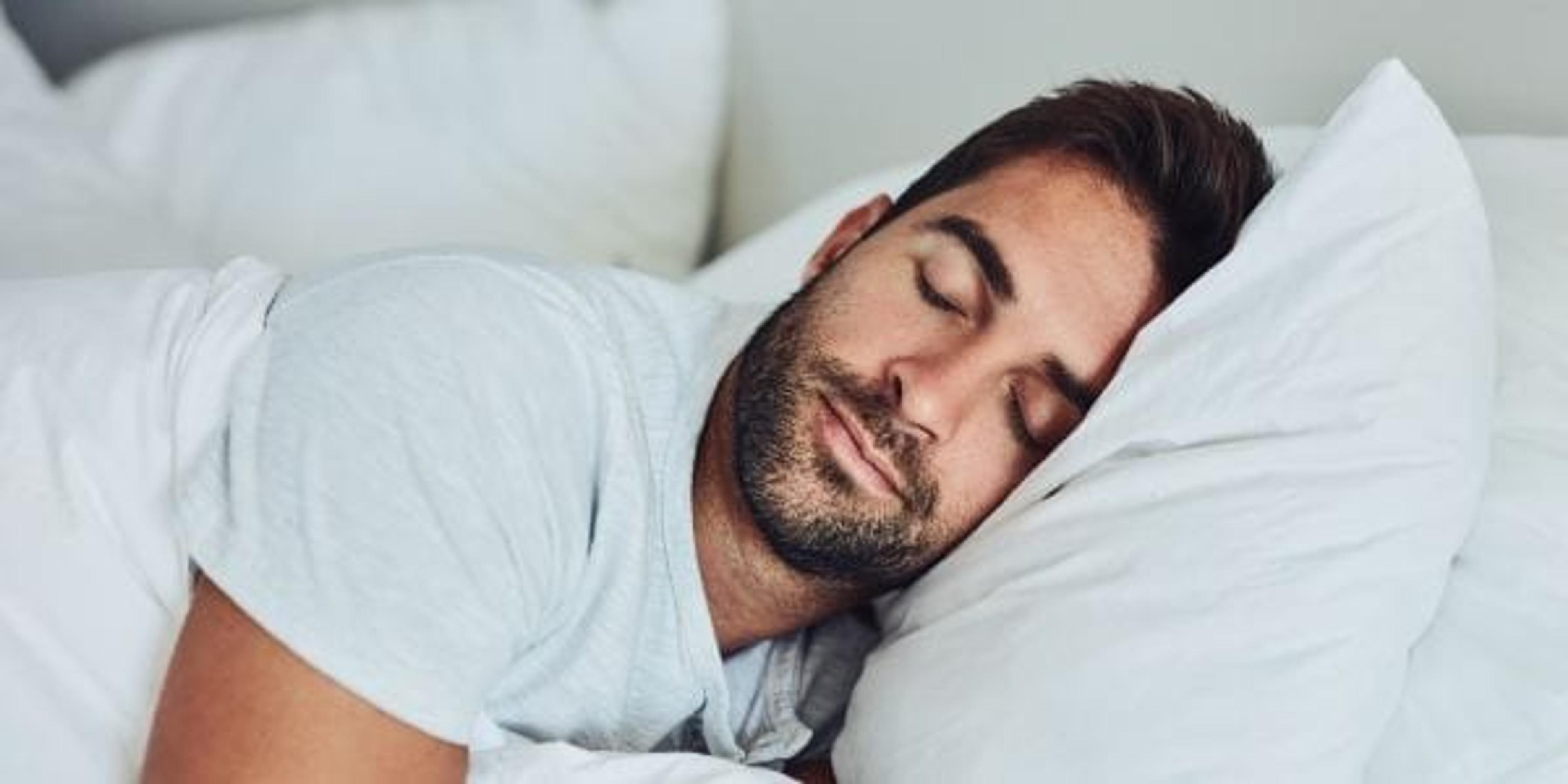 Image of a young man sleeping soundly.