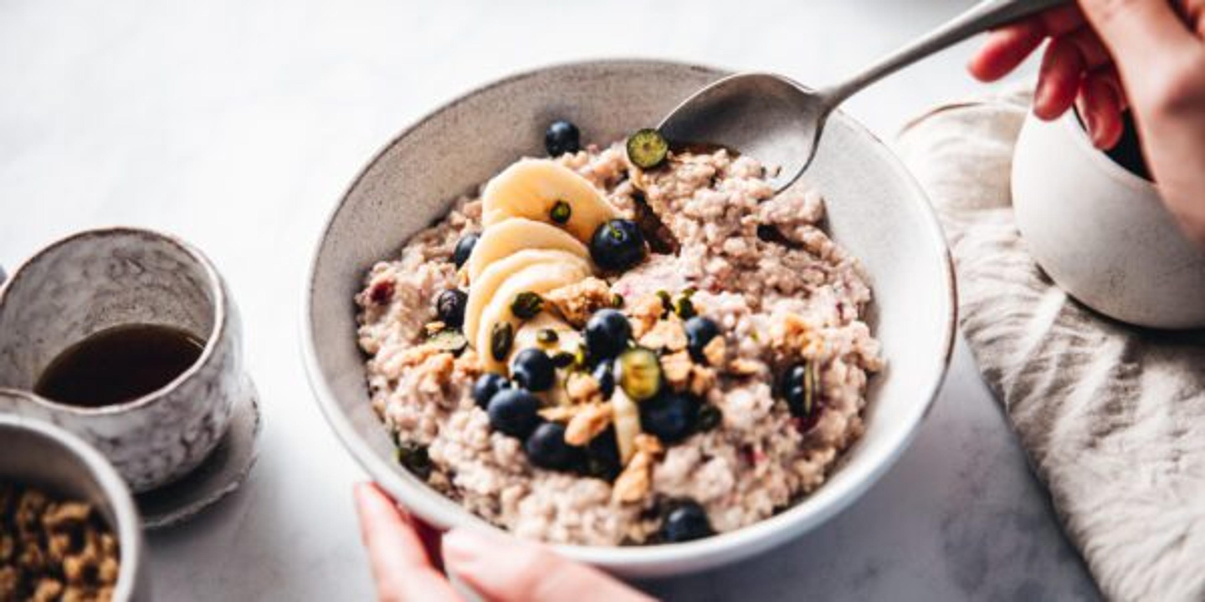 Sitting down to a bowl of oatmeal.