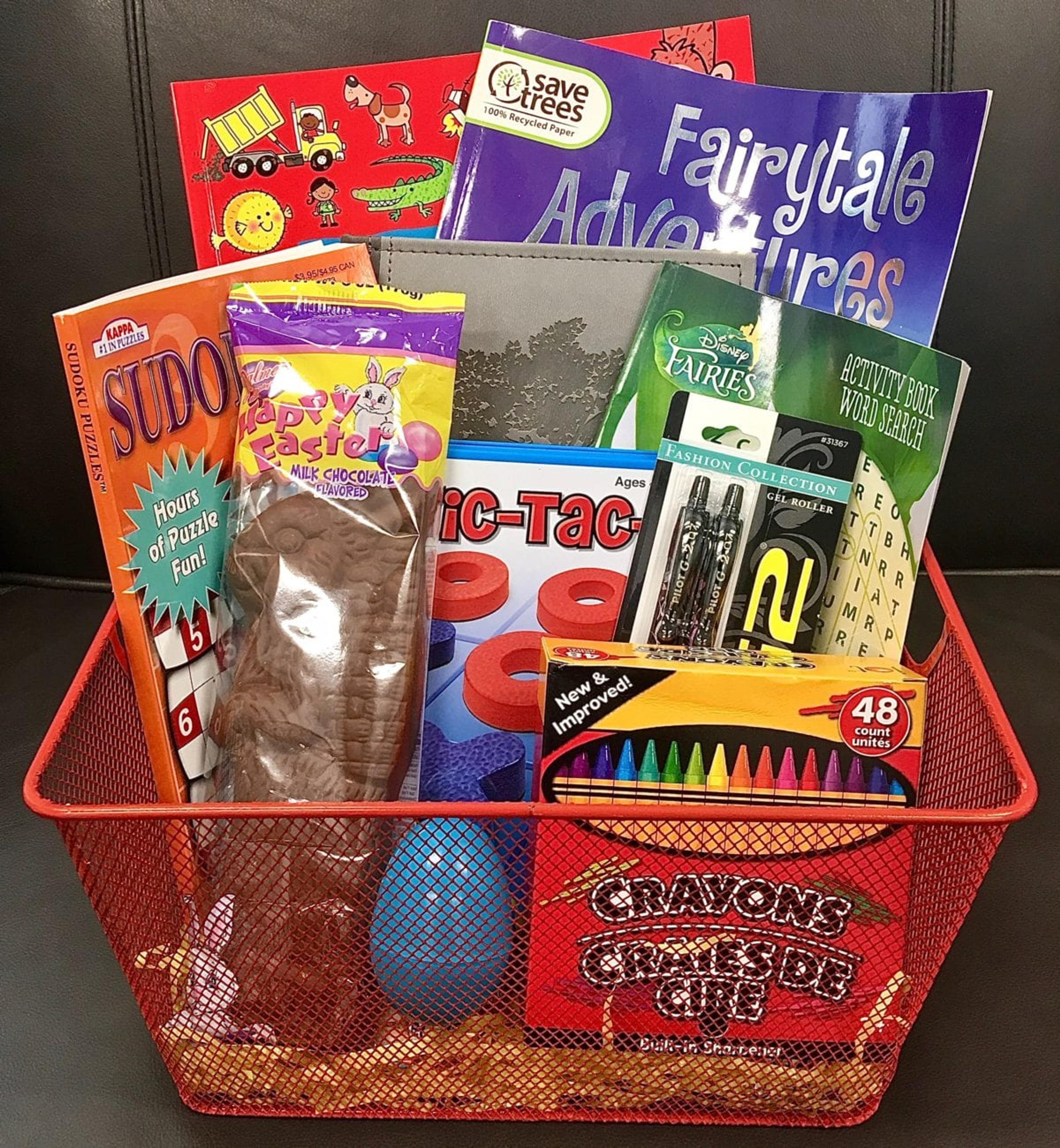 Creative Easter basket with crayons and coloring books