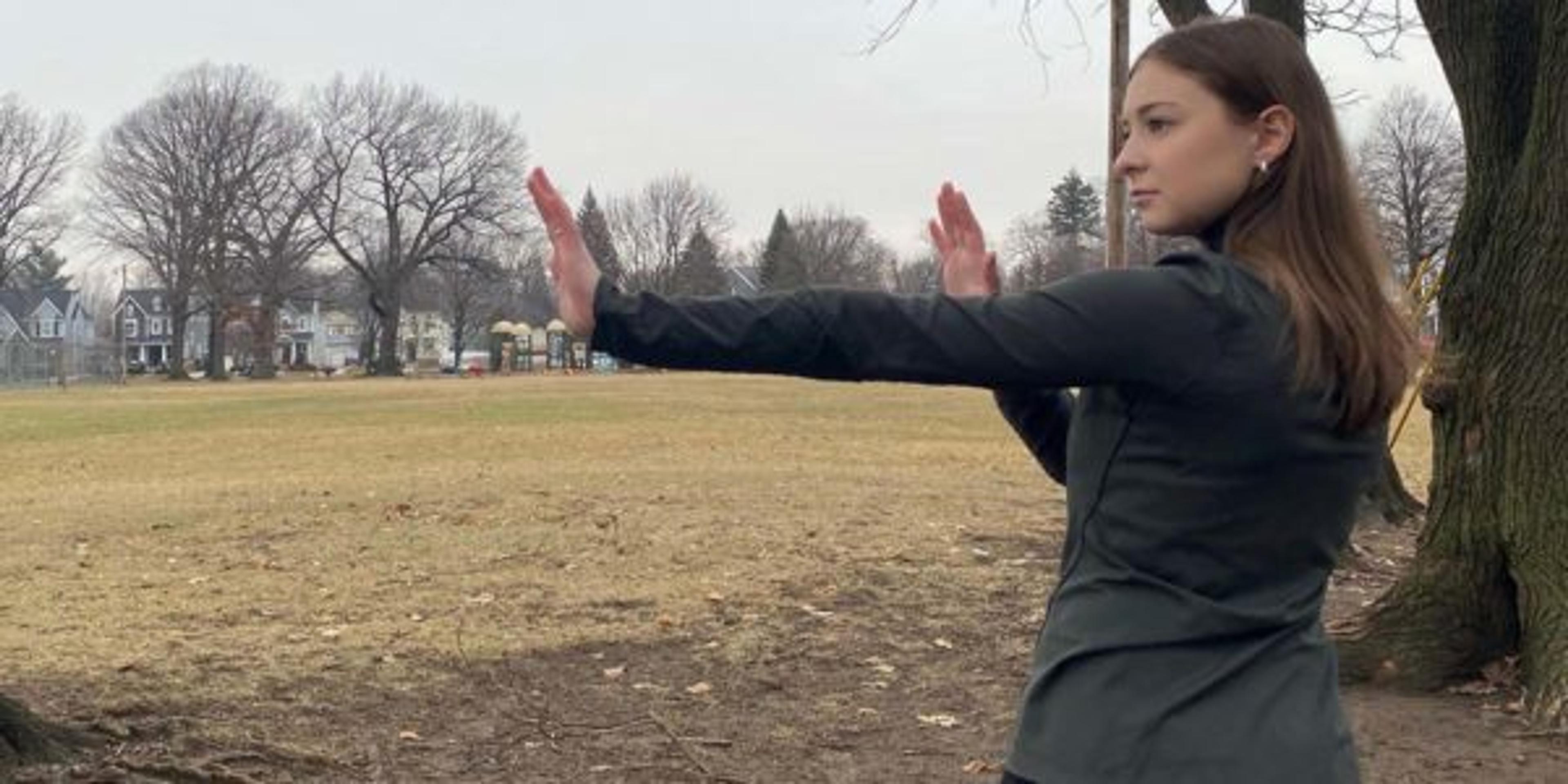 Woman practicing self defense