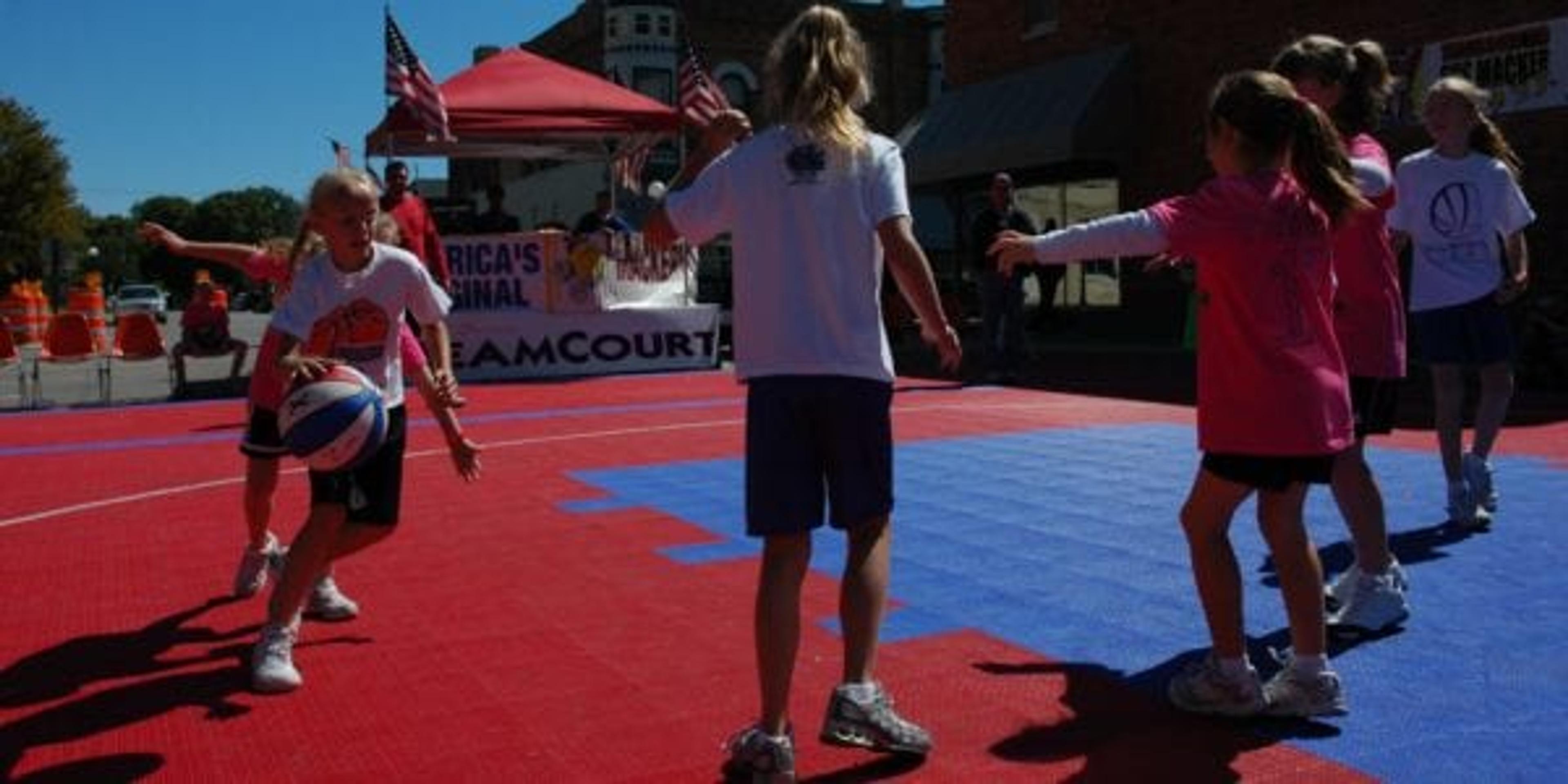 Girls playing basketball at Gus Macker tournment