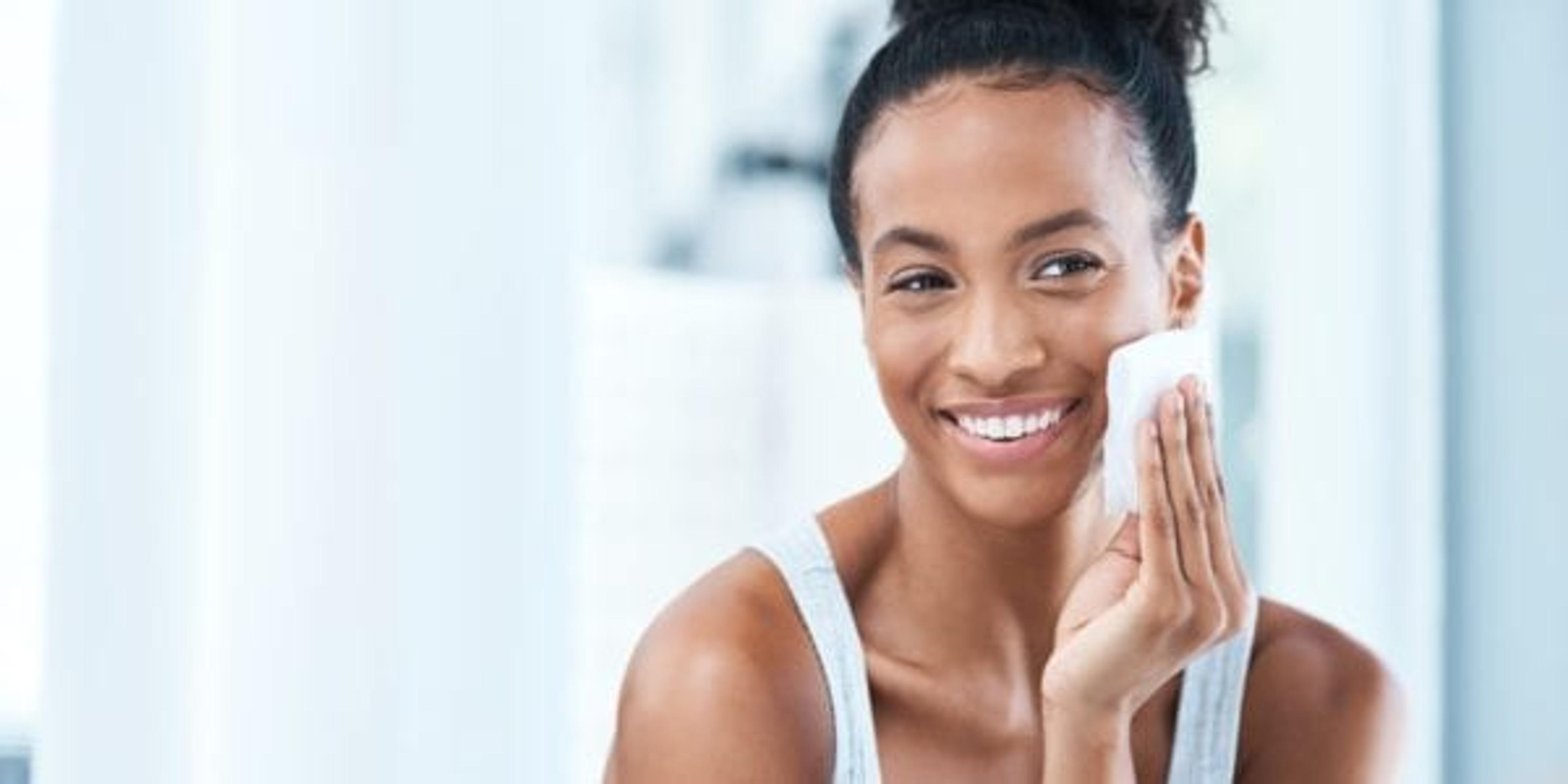 Woman washing her face