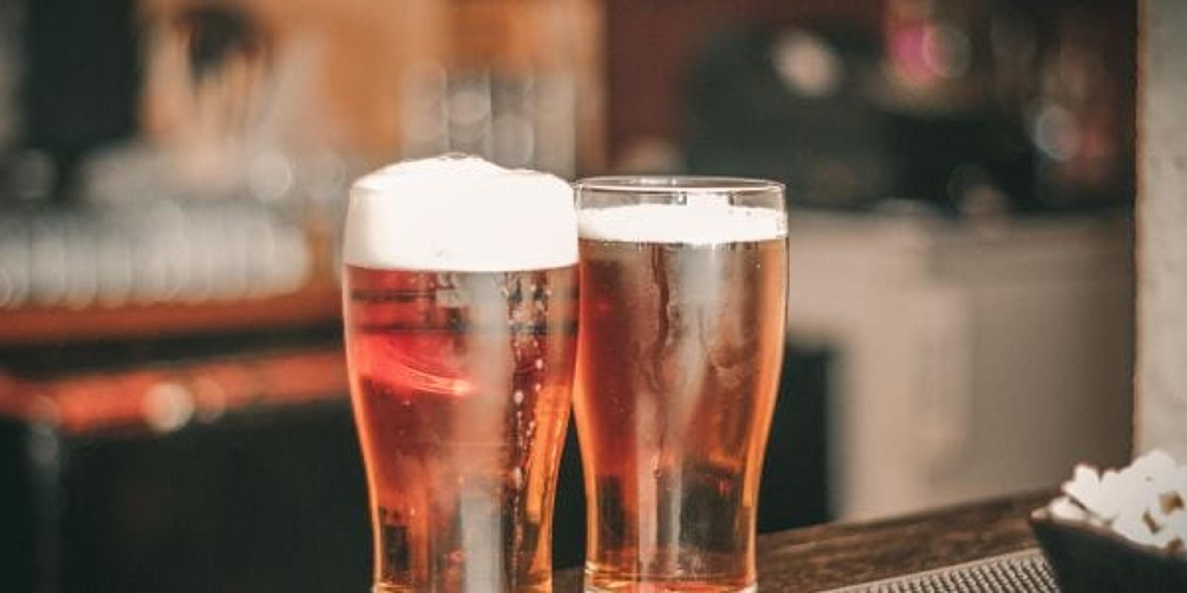 Two beers on bar counter