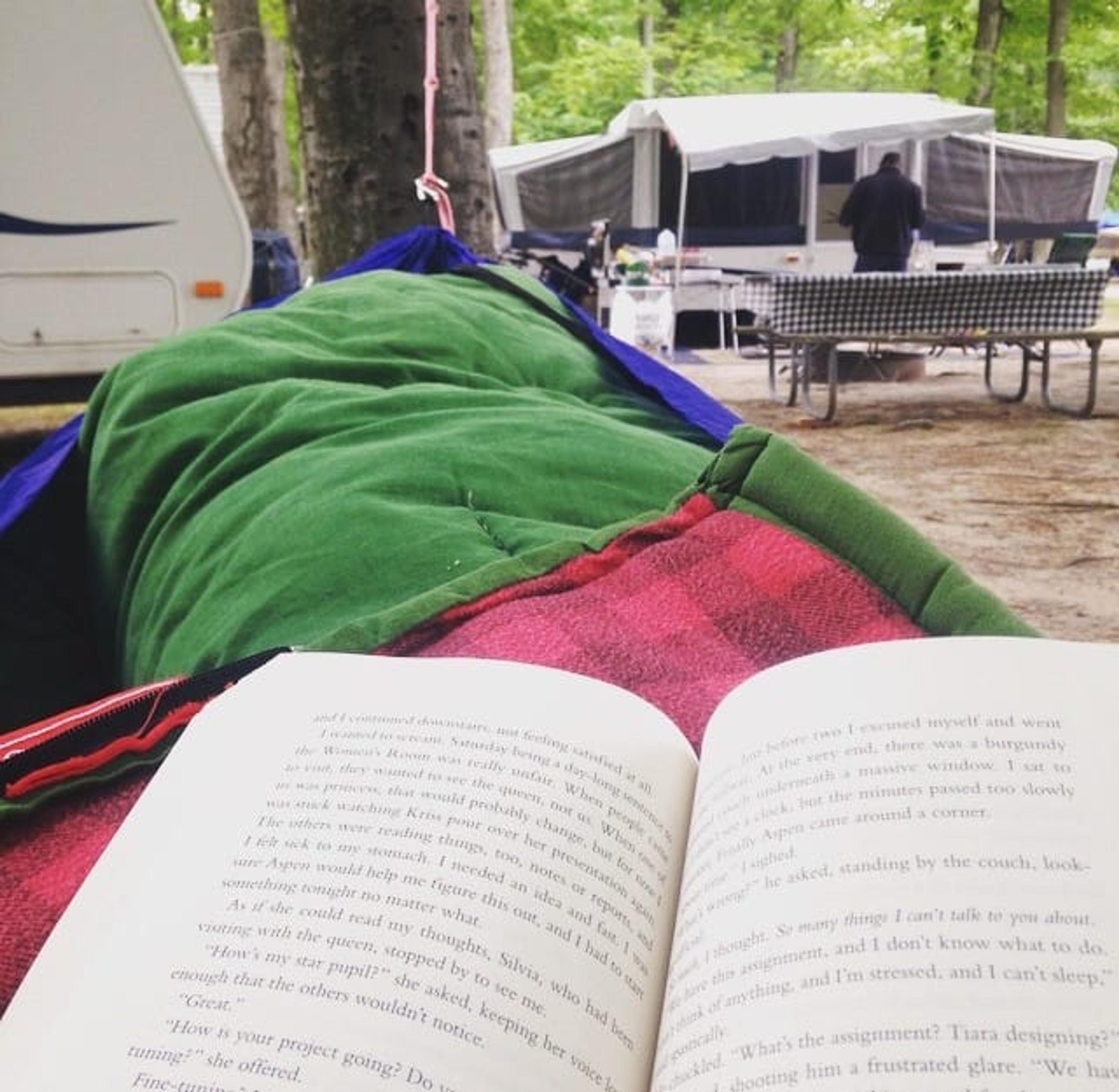 Hammocks can be the perfect place to read, relax while camping.
