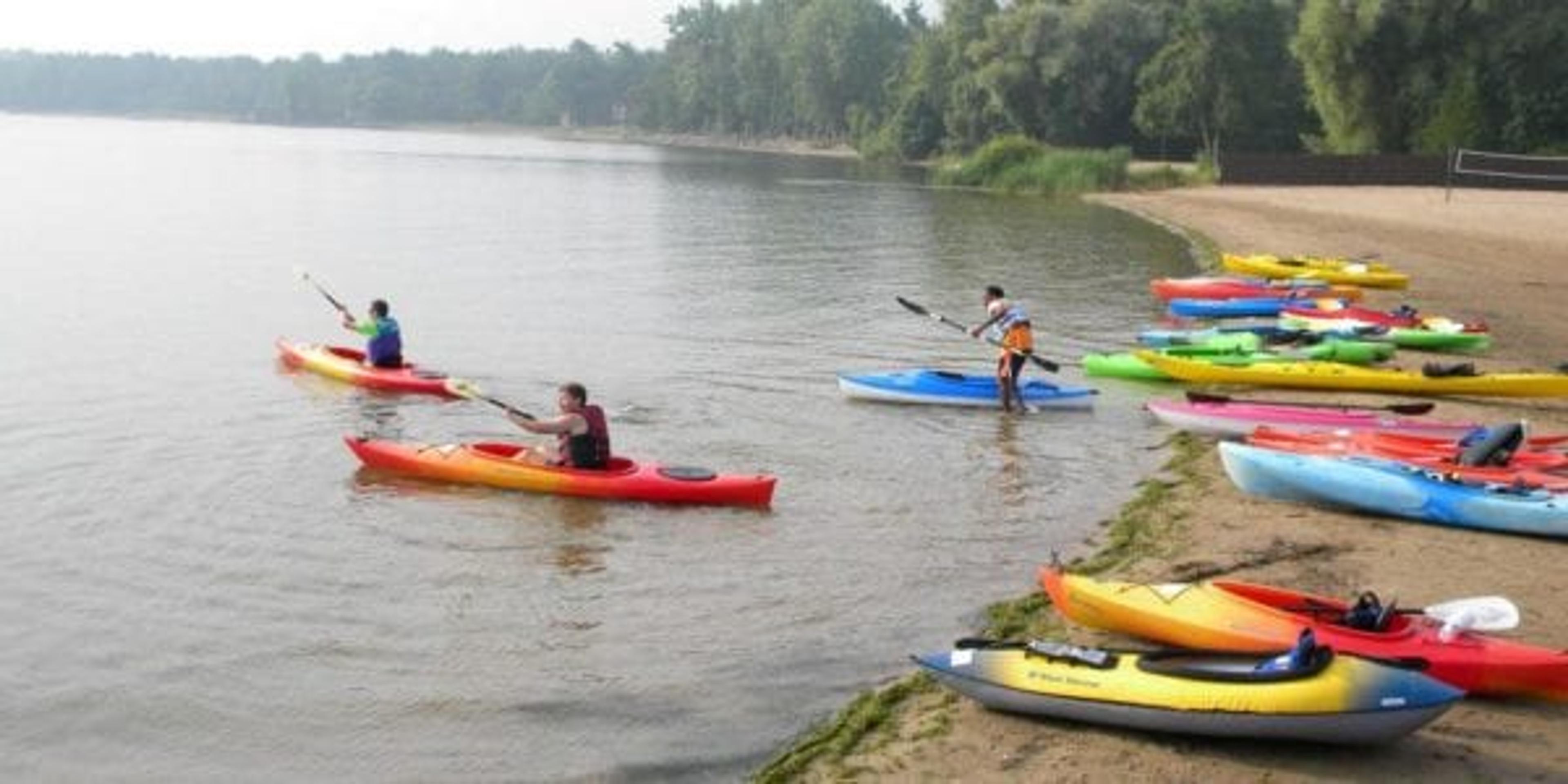 Biyakathon participants heading into the water to start the kayaking portion of the race.