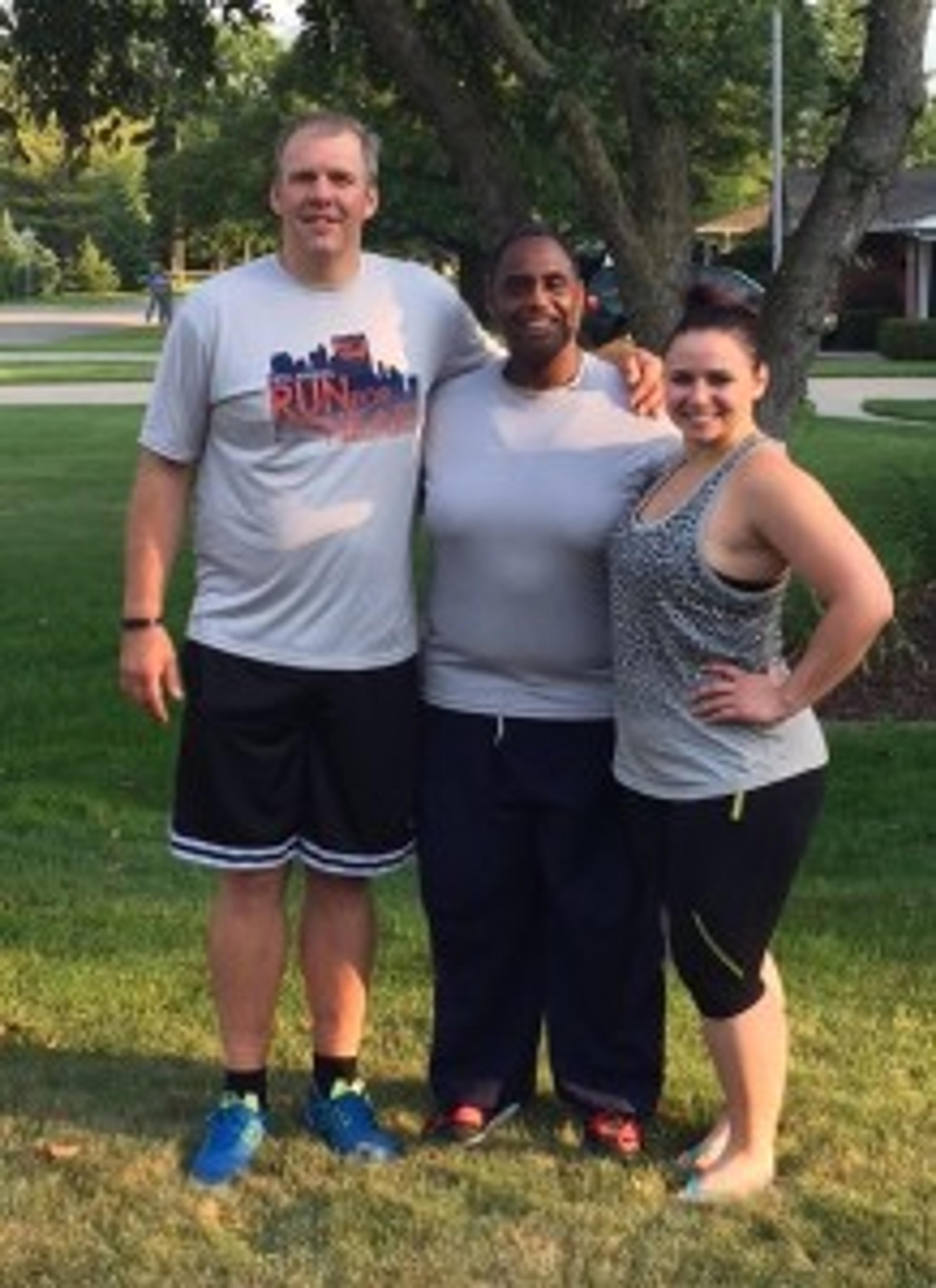 David Hall is inspired by the people he runs with. From left: Marc Kaeckmeister, David Hall, Brooke Devereaux. 