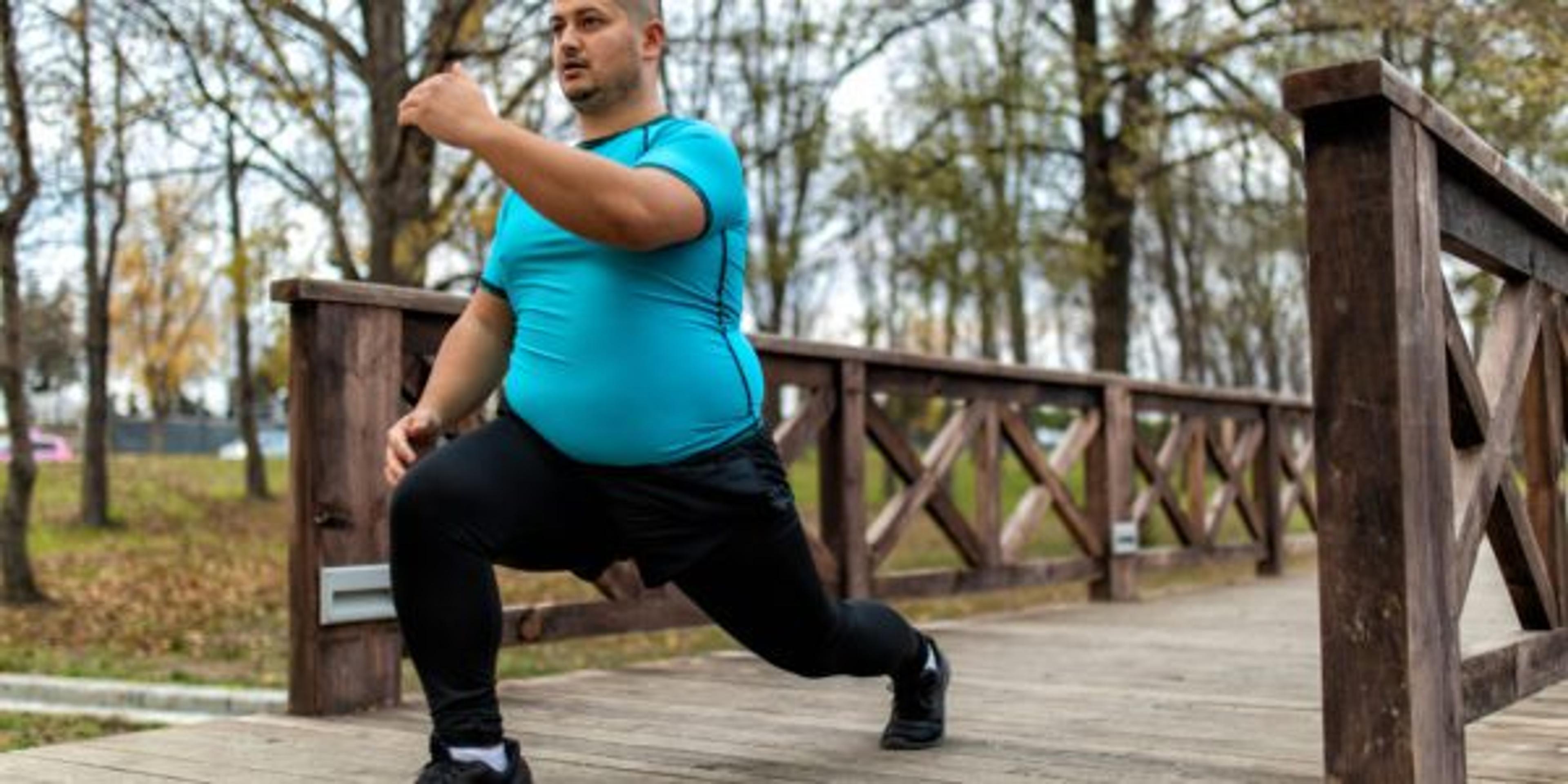 Man practices static stretching