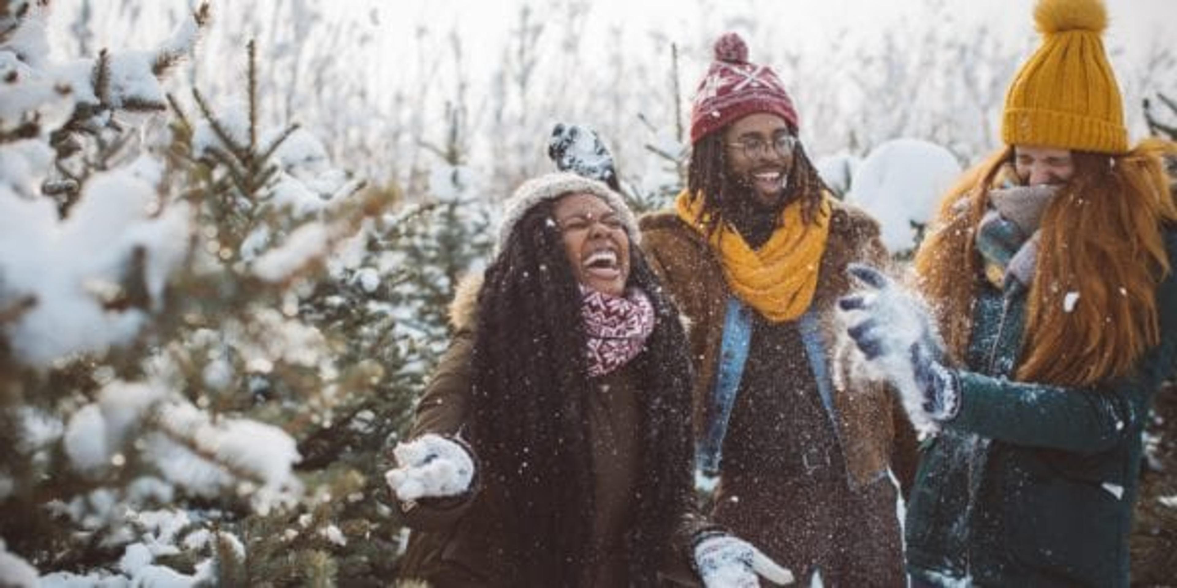 Friends having a snowball fight