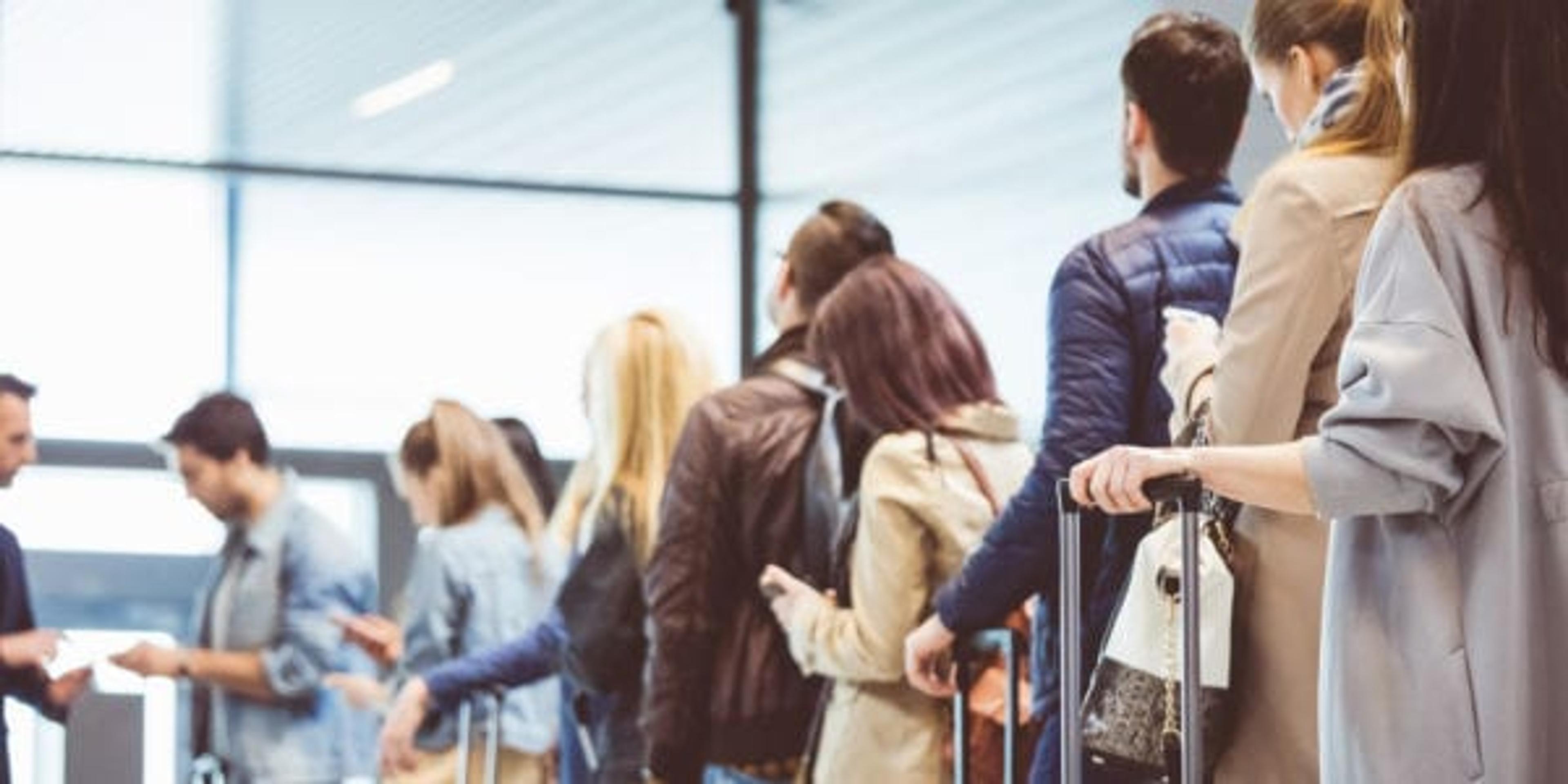 People waiting in line at the airport