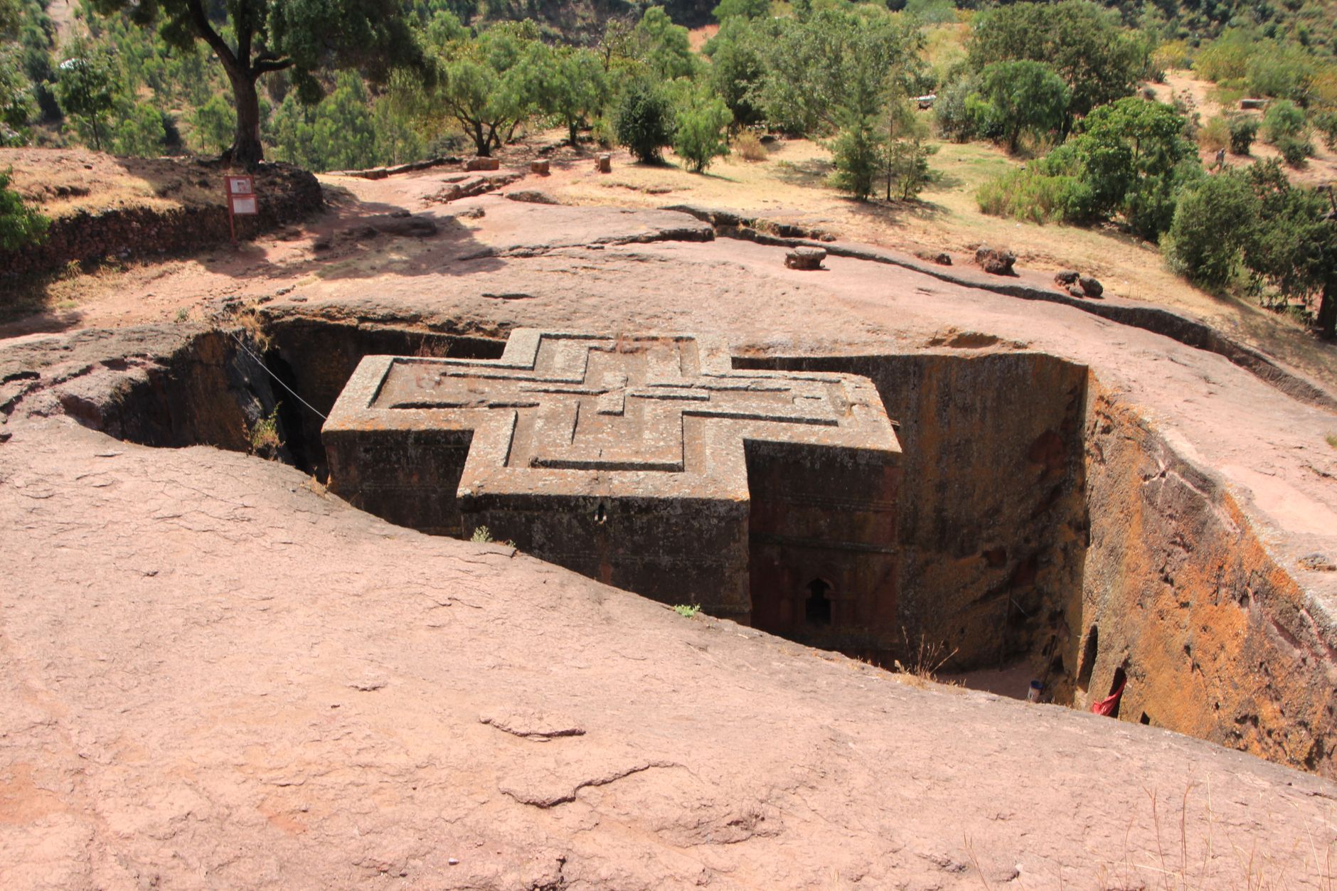 Aerial view of the cross-shaped roof of the Church of Saint George, Lalibela