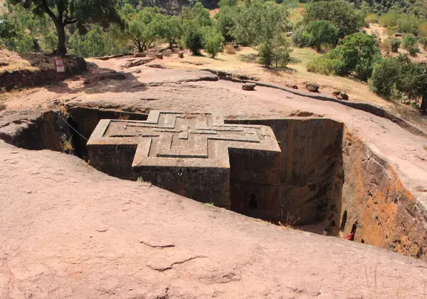 Aerial view of the cross-shaped roof of the Church of Saint George, Lalibela