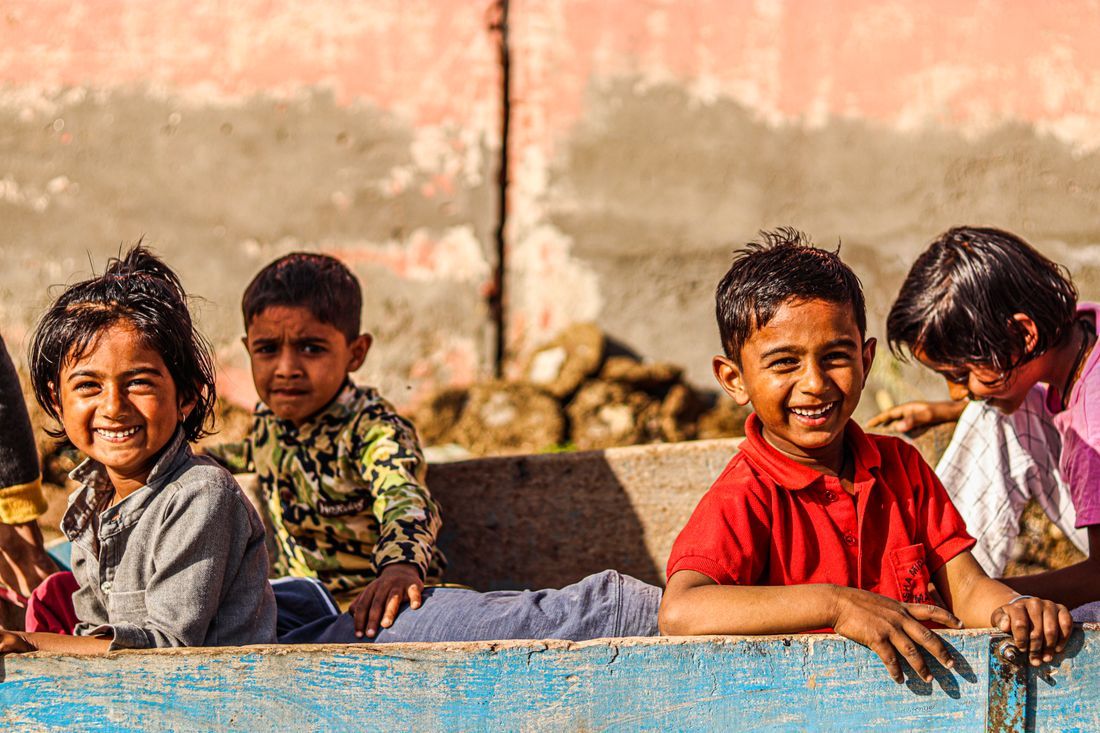 Smiling children together outdoors