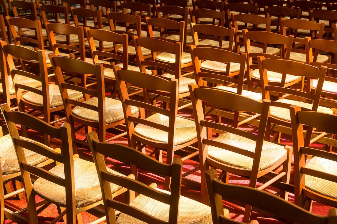 Rows of chairs set out and ready before a service