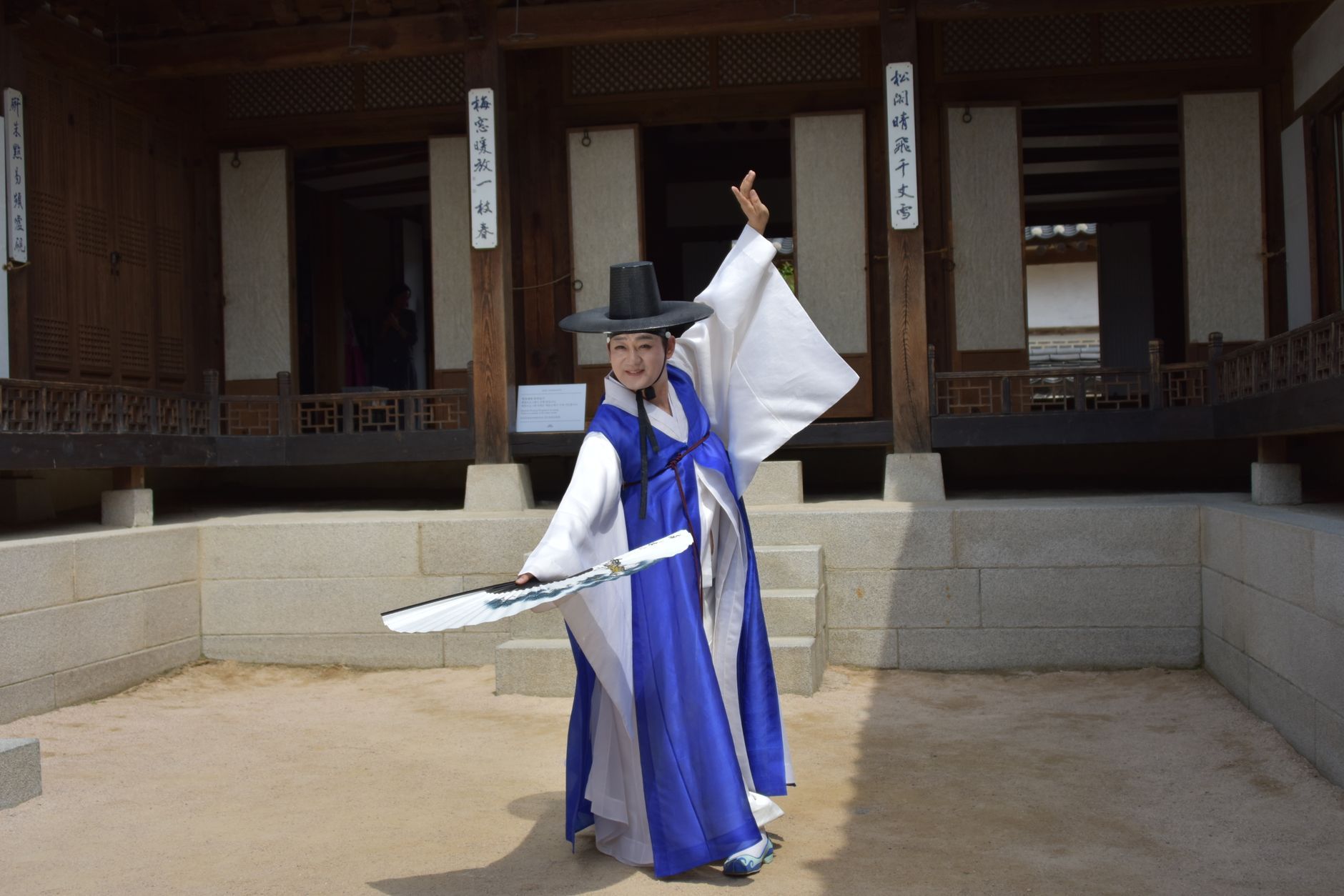 A Korean woman dancing in hanbok