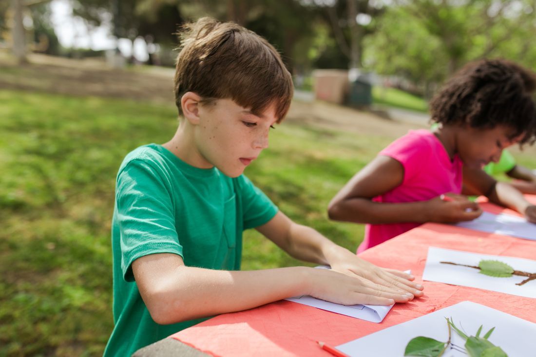 Children doing a craft activity at a vacation Bible school