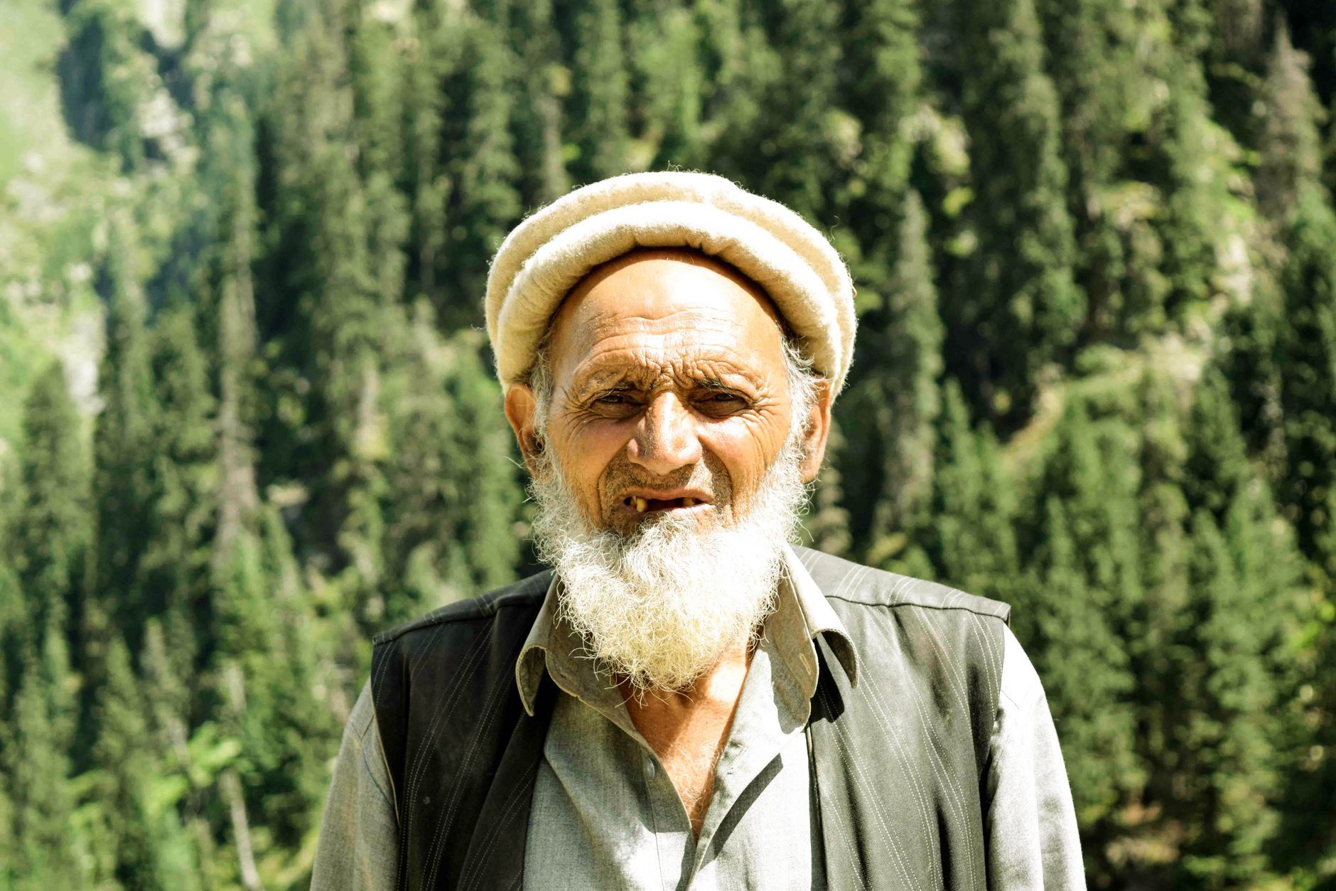 An elderly Pakistani man in the northern mountains